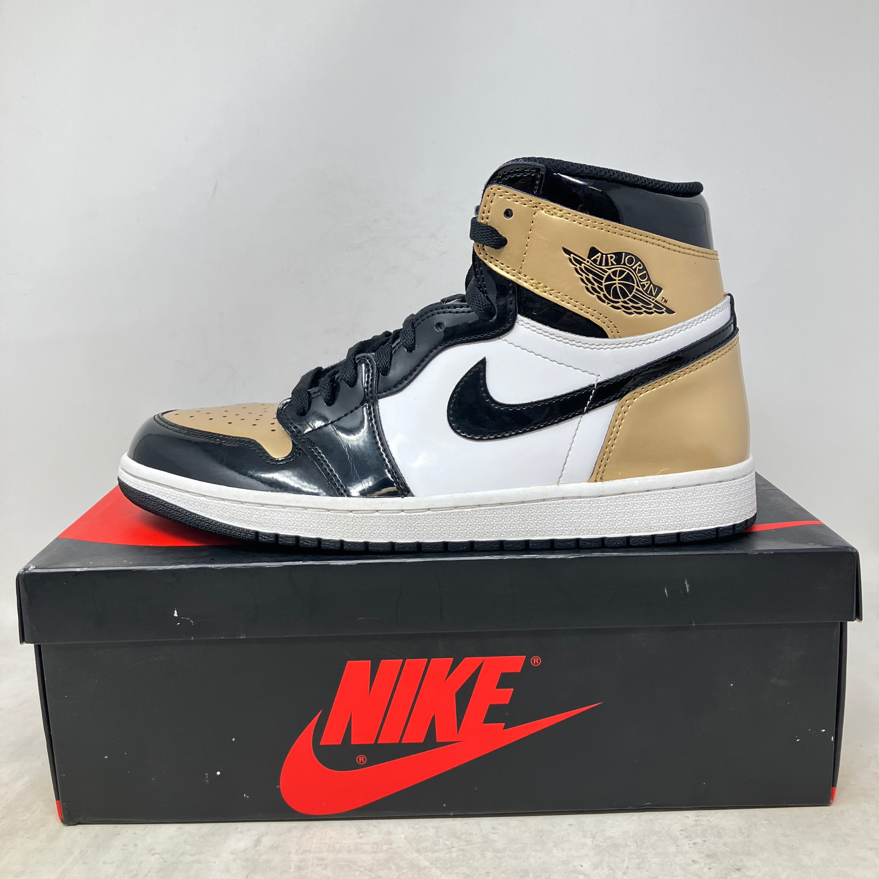 Jordan 1 Retro High NRG Patent Gold Toe