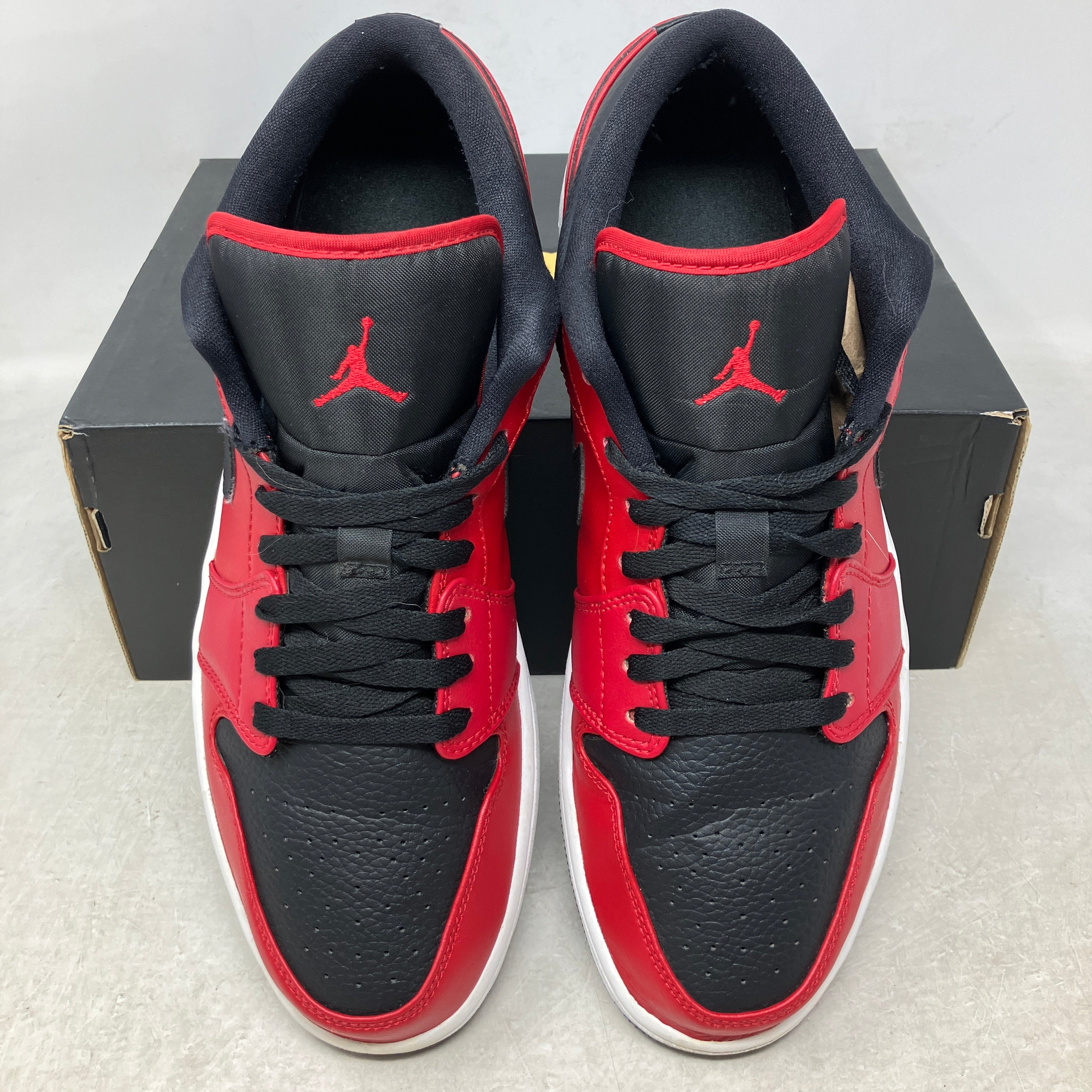 Jordan 1 Low Reverse Bred Pebbled Swoosh