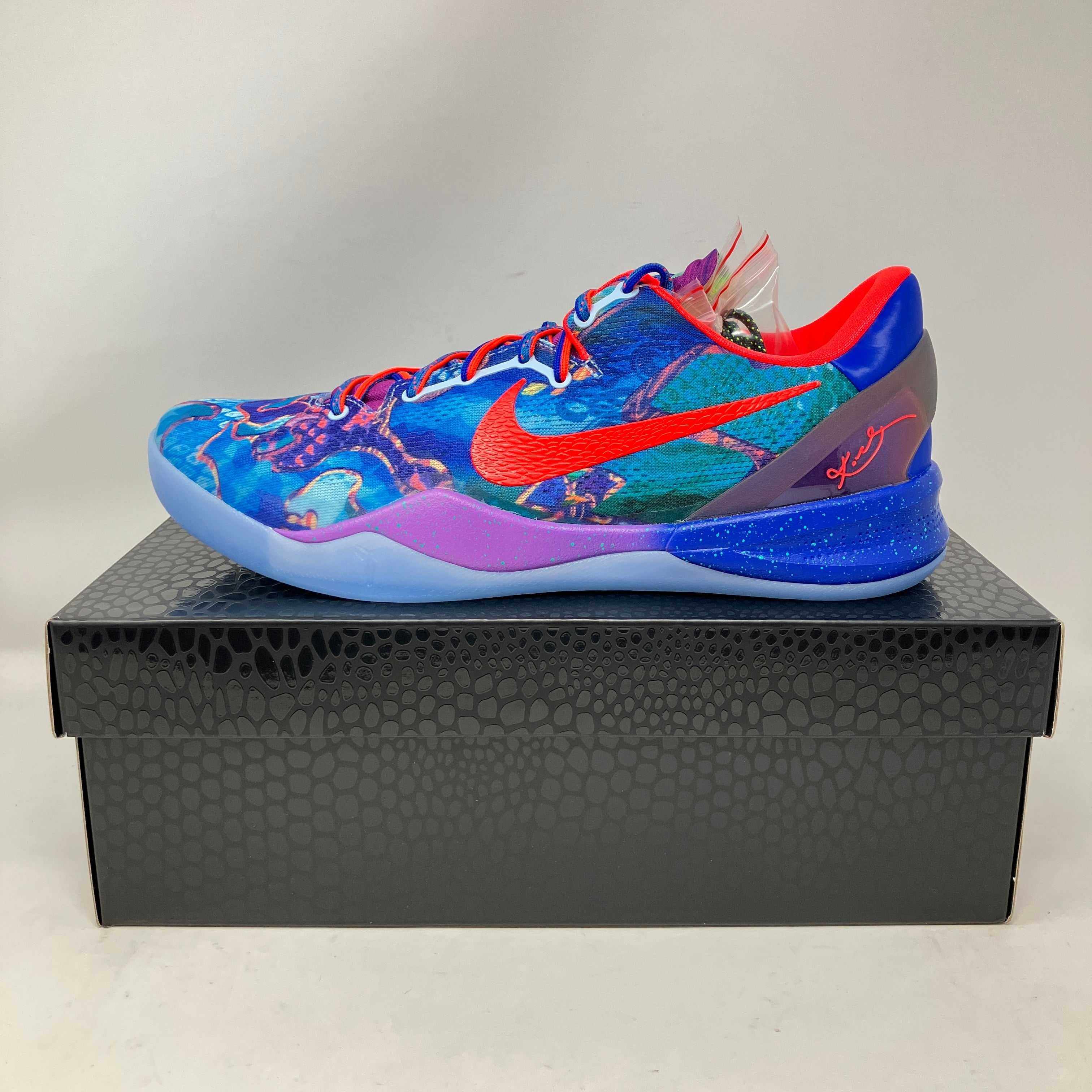 Nike Kobe 8 Protro What The 2025 basketball shoe in vibrant multicolor on black textured box