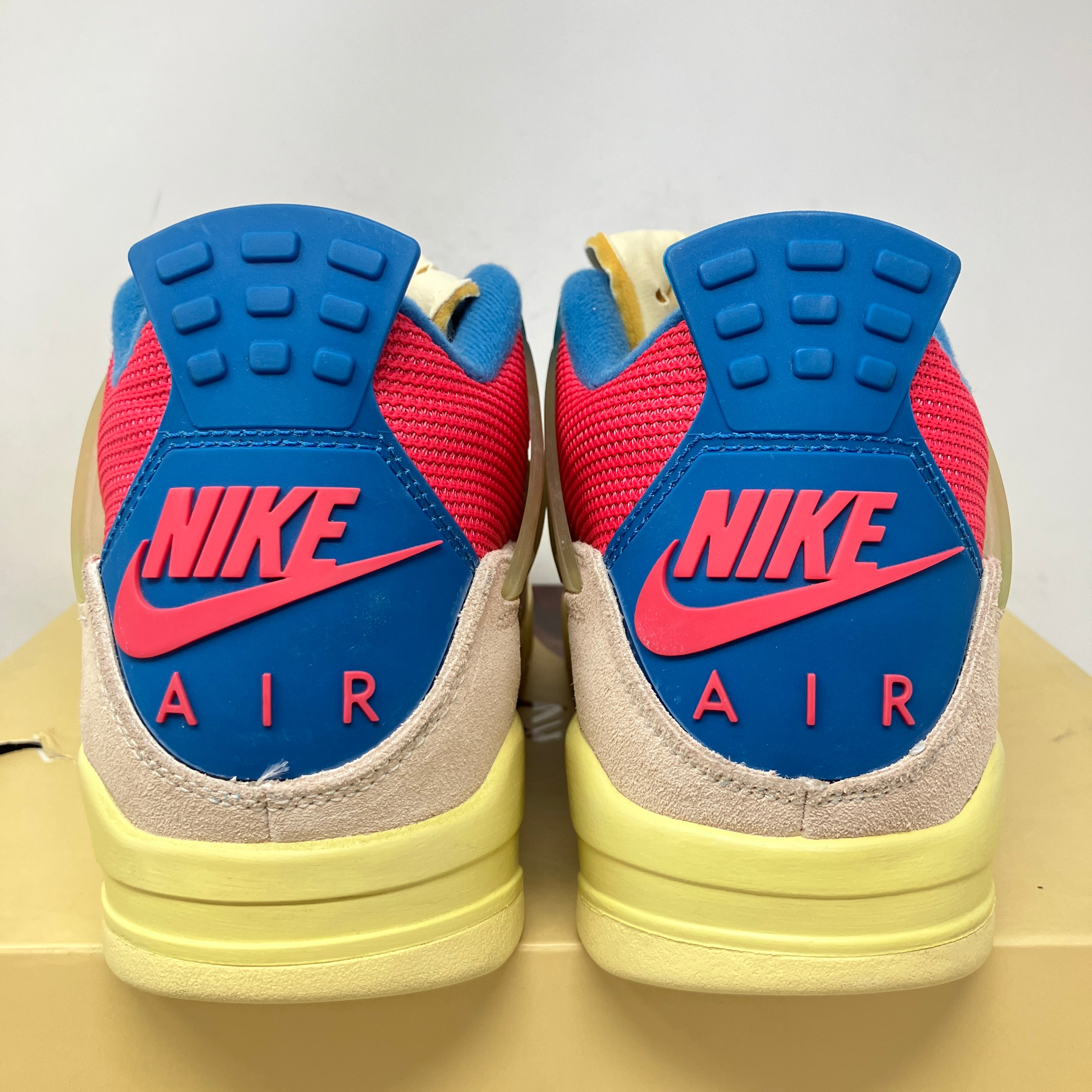 Jordan 4 Retro Union Guava Ice