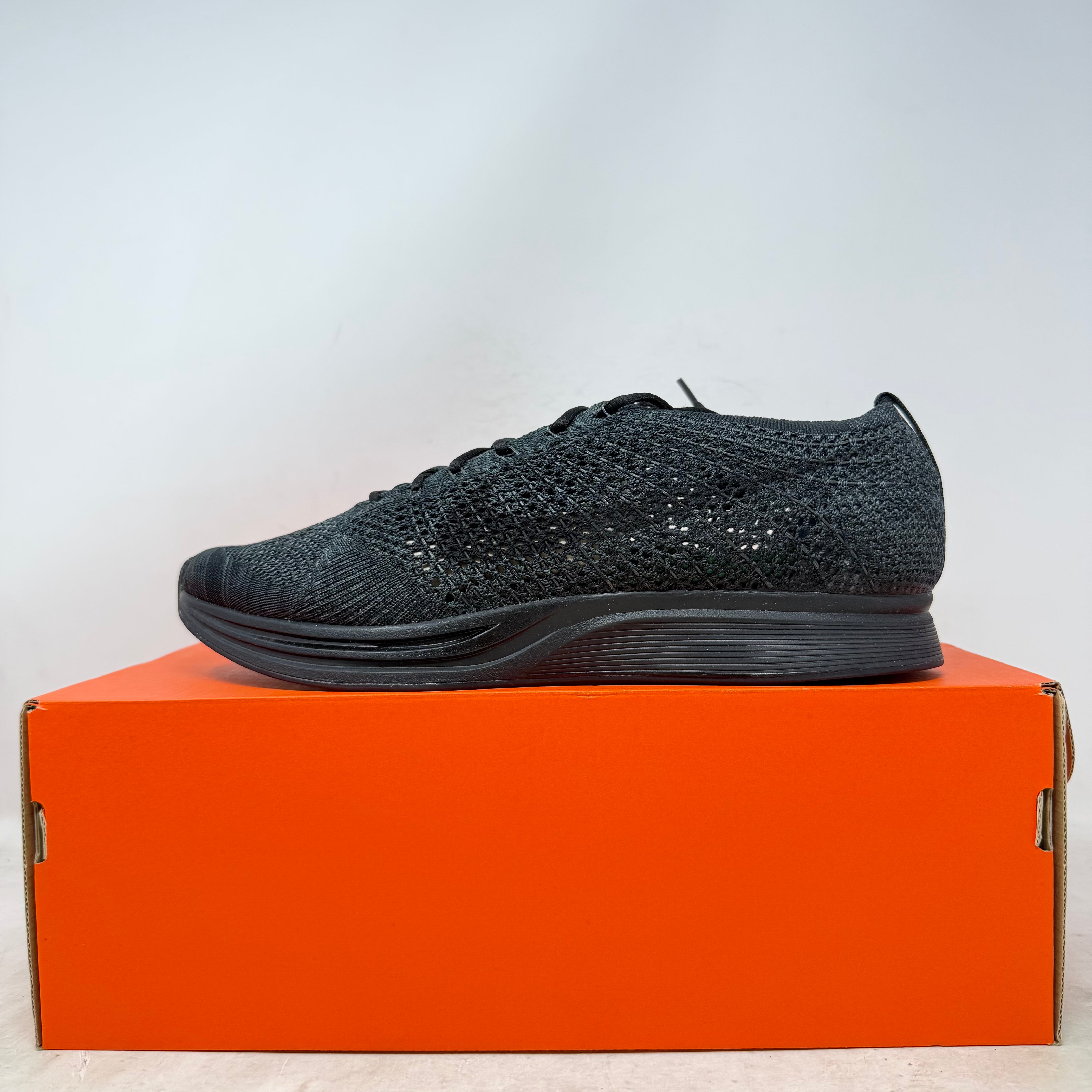 Nike Flyknit Racer Triple Black
