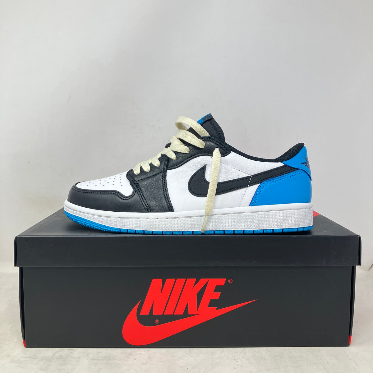 Jordan 1 Retro Low OG Black Dark Powder Blue