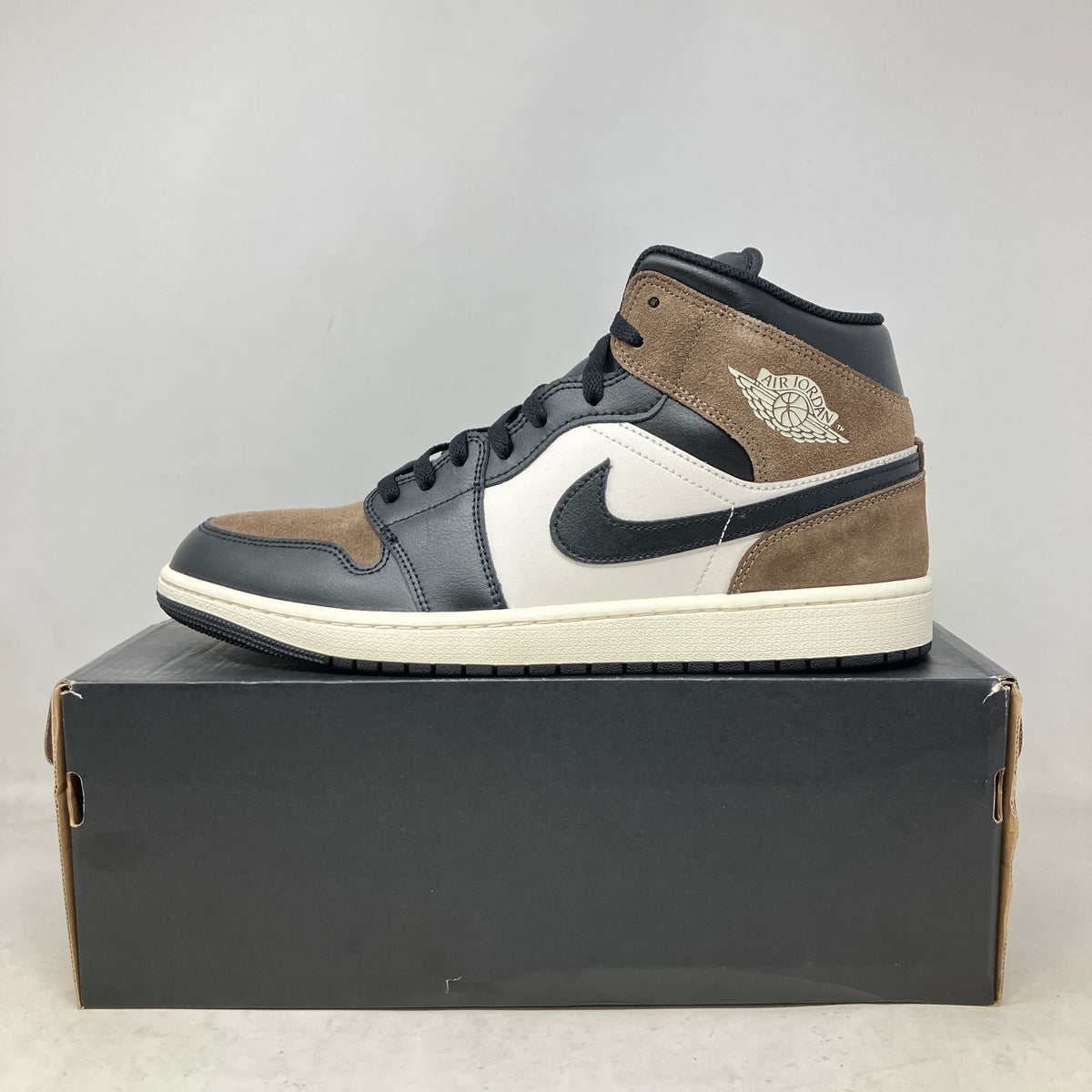 Jordan 1 Mid Black Palomino