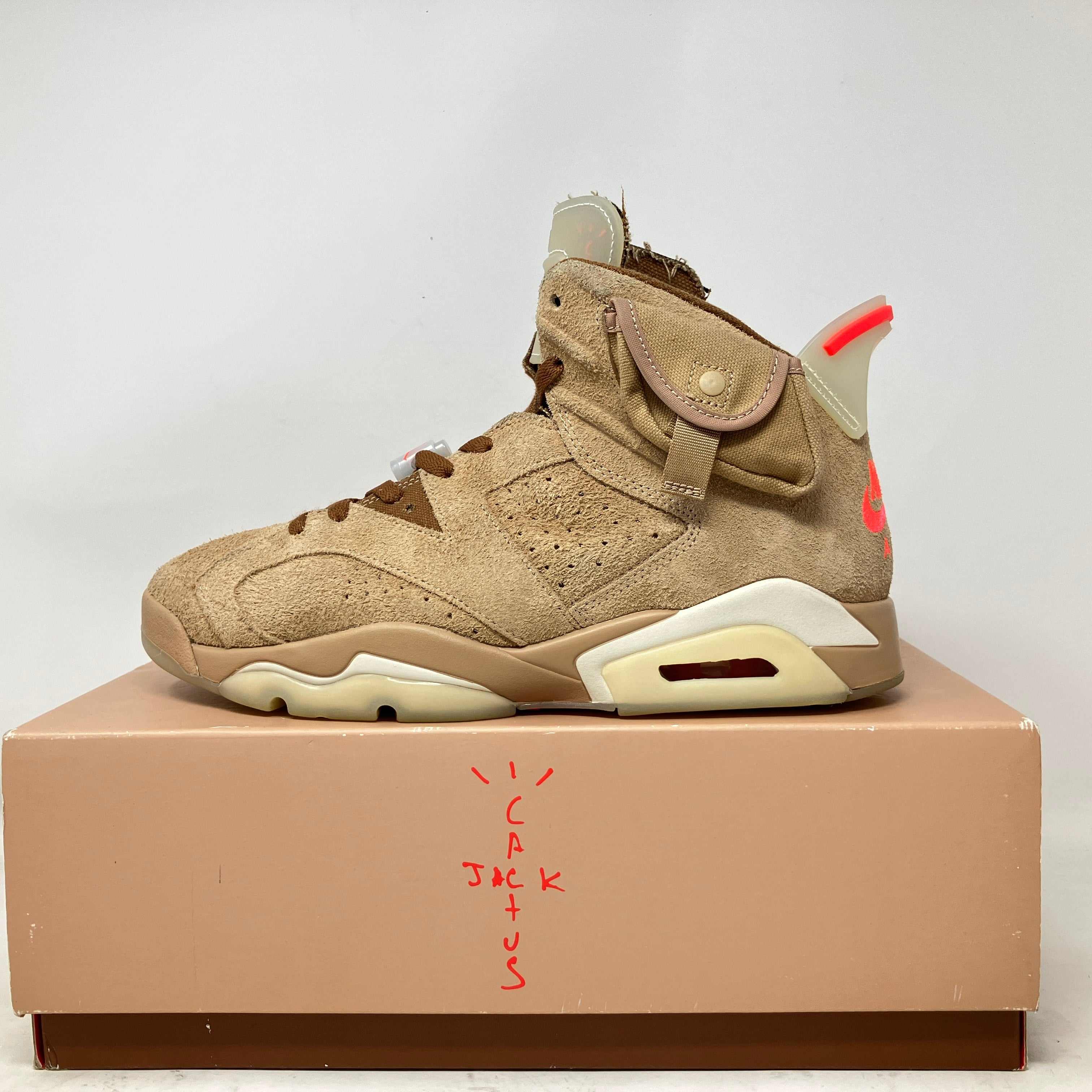 Jordan 6 Retro Travis Scott British Khaki sneaker with suede upper and small pocket detail on side, pre-owned condition on box with Cactus Jack logo