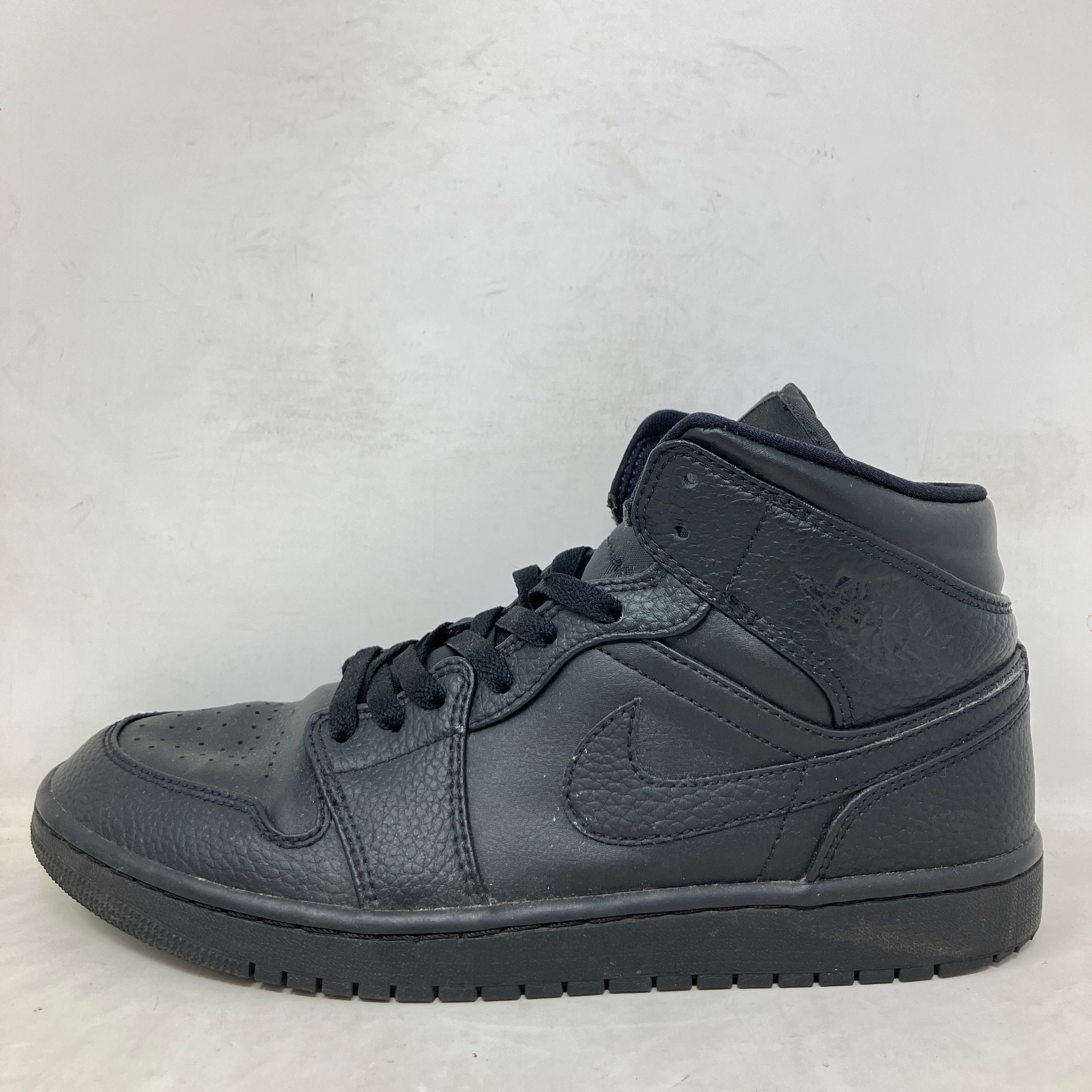 Jordan 1 Mid Triple Black