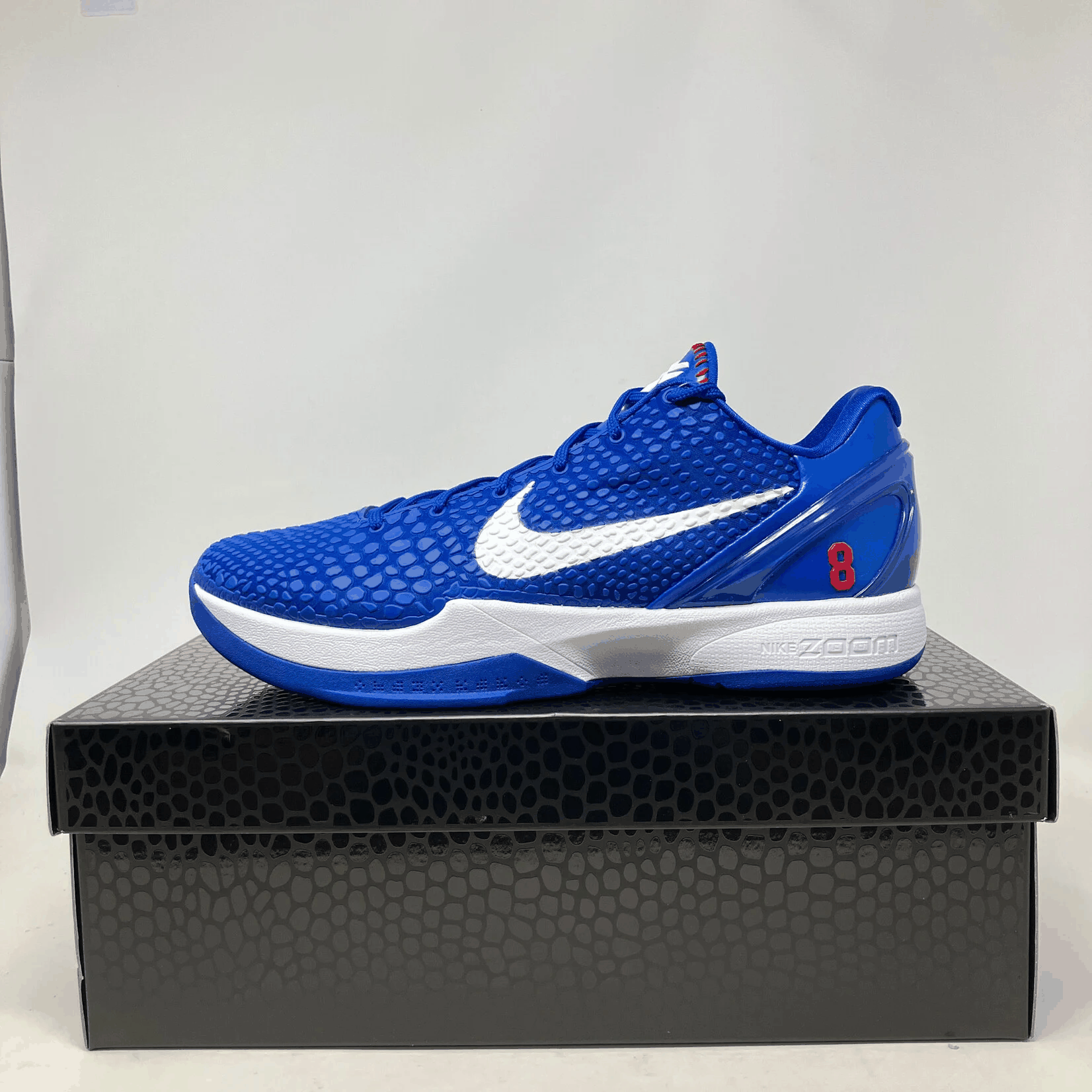 Nike Kobe 6 Protro Dodgers blue basketball shoe with white swoosh on black box, brand new with accessories included