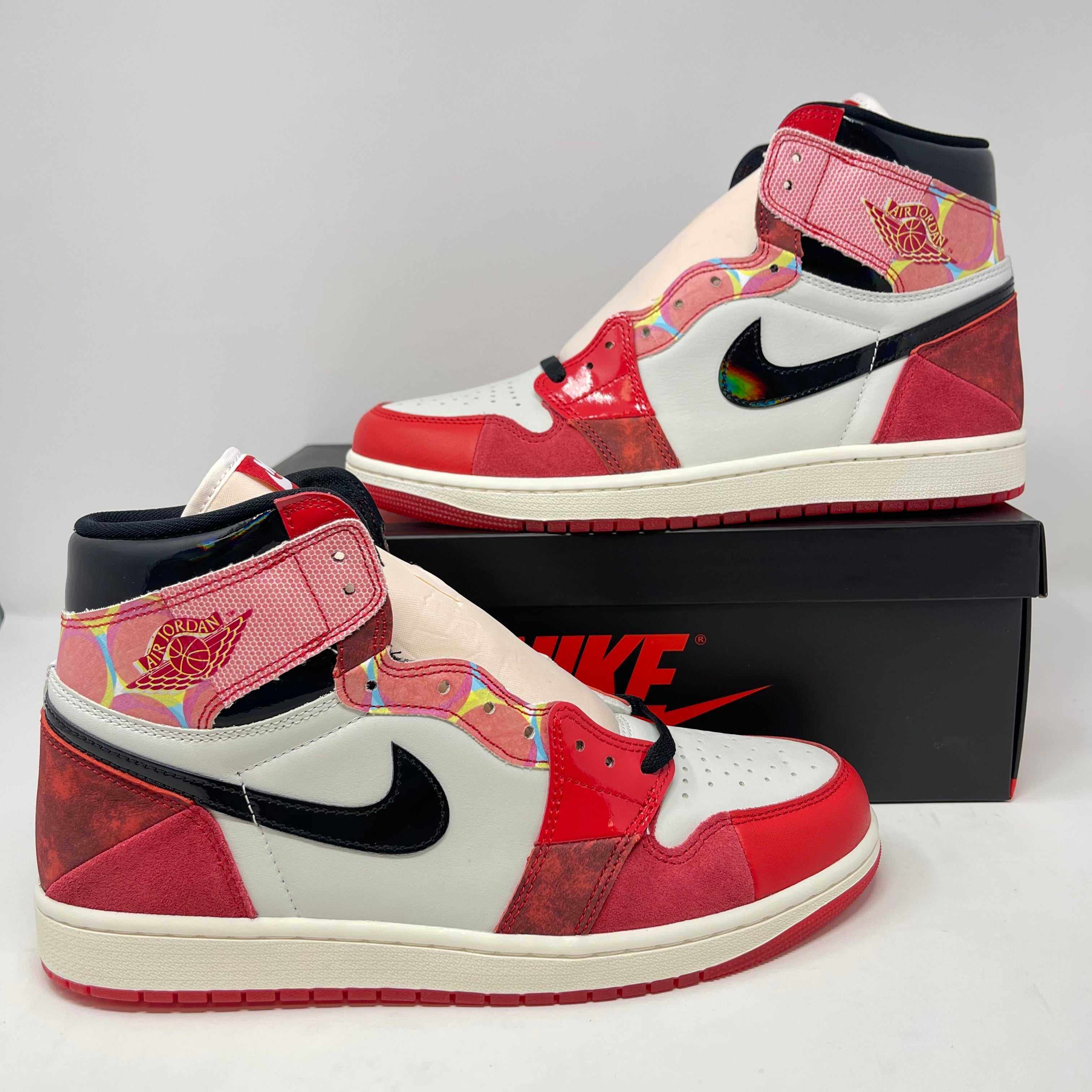 Jordan 1 Retro High OG Spider-Man sneakers, brand new condition, displayed on a black Nike box.