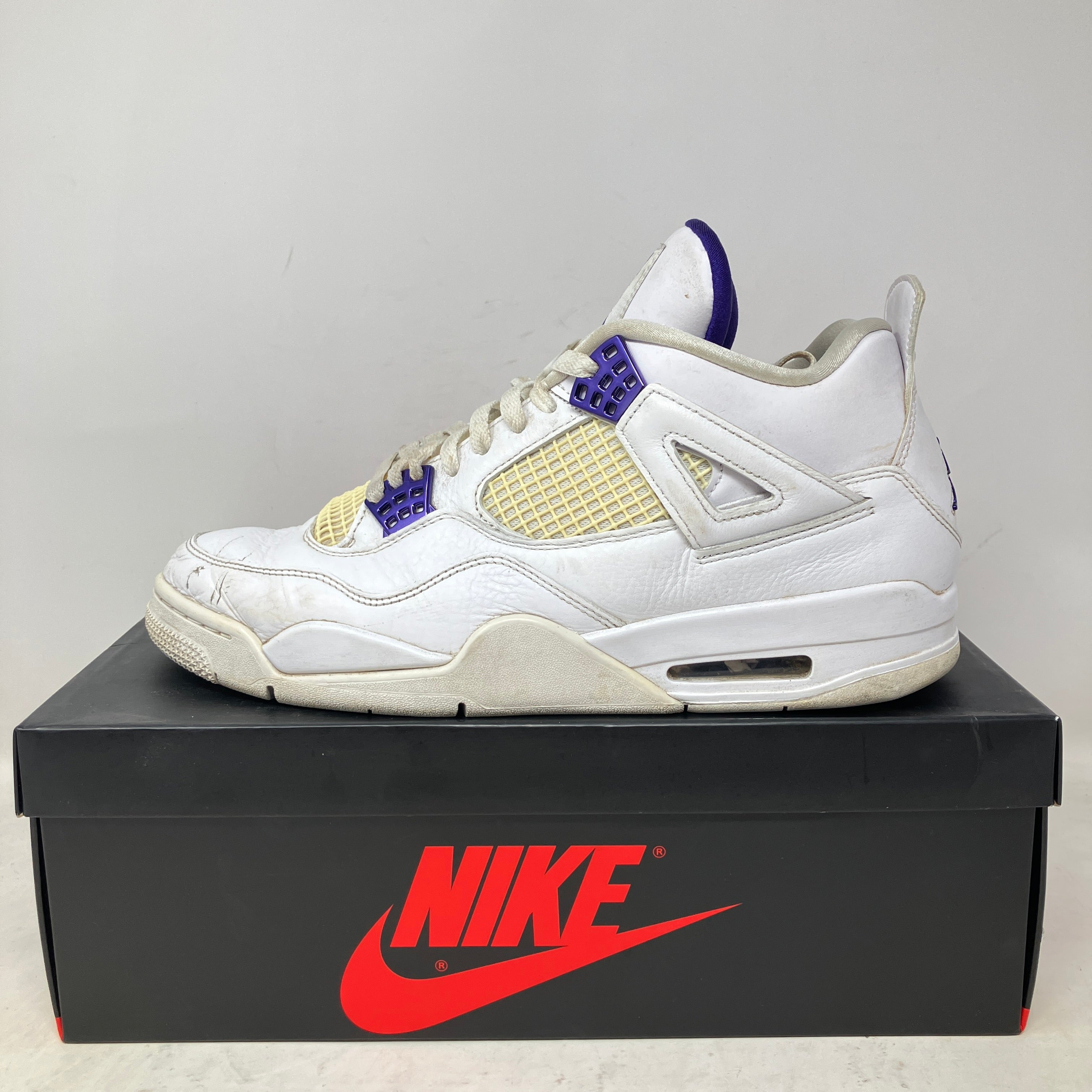 metallic purple jordans 4