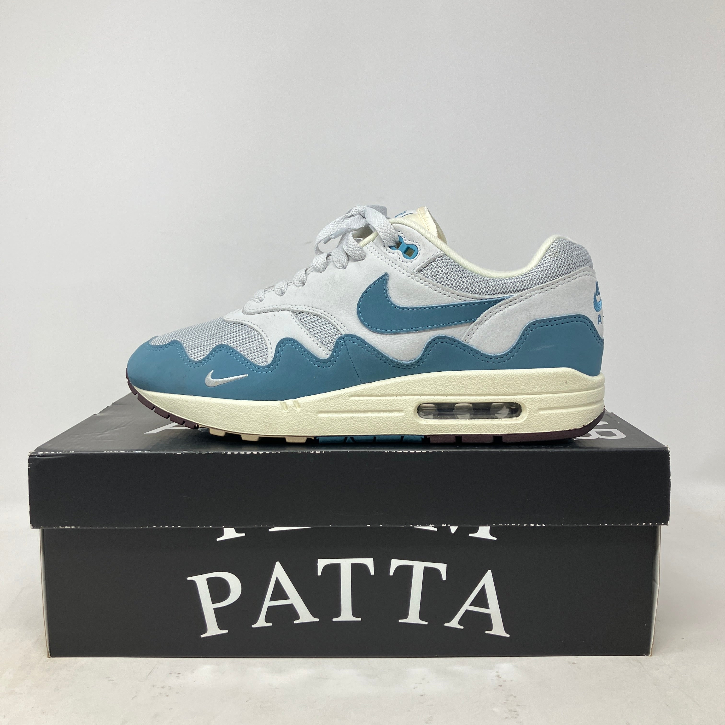Pre-owned Nike Air Max 1 Patta Waves Noise Aqua sneaker on black Patta box with all accessories included