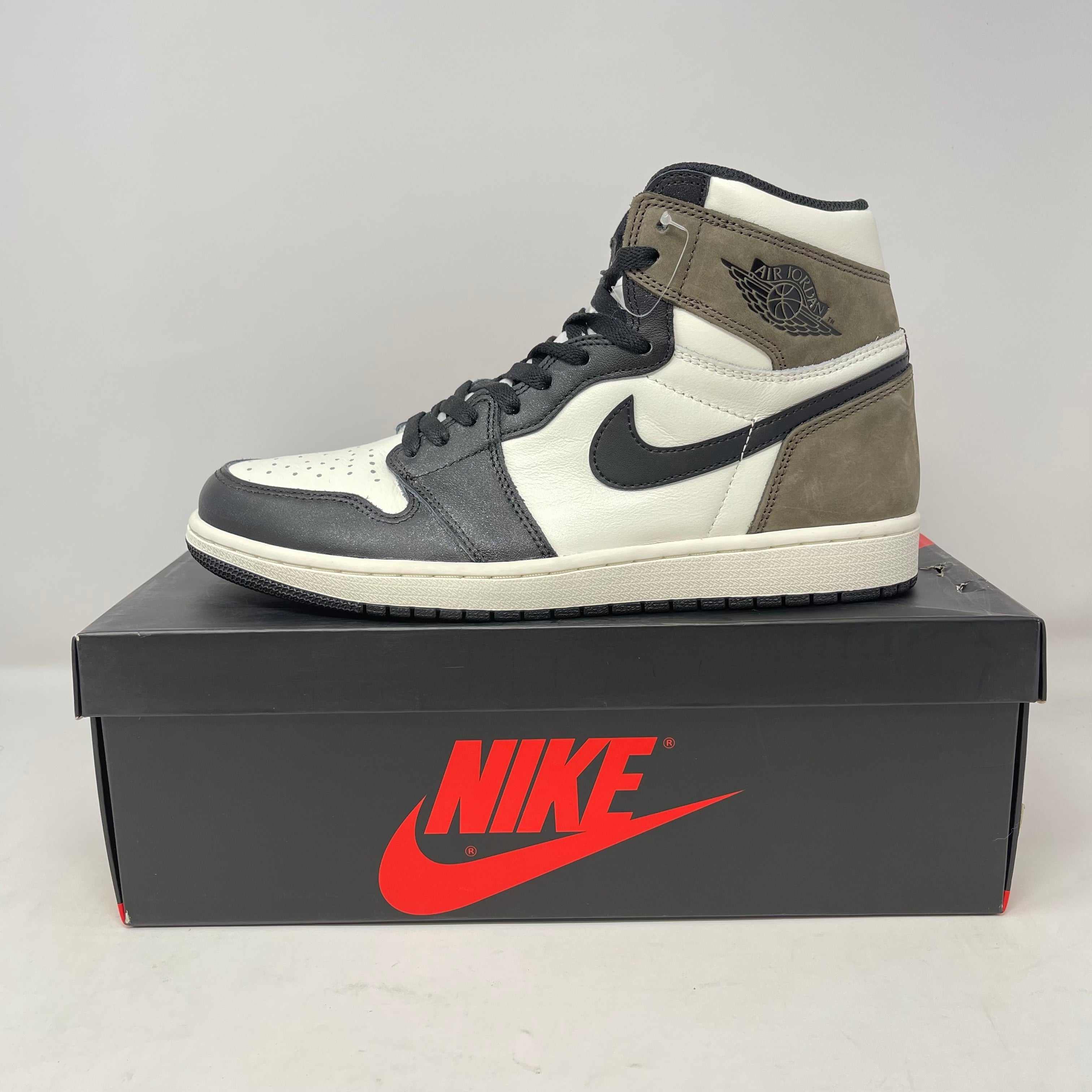 Jordan 1 Retro High Dark Mocha sneaker in black, white, and mocha colors on Nike box, brand new with accessories included