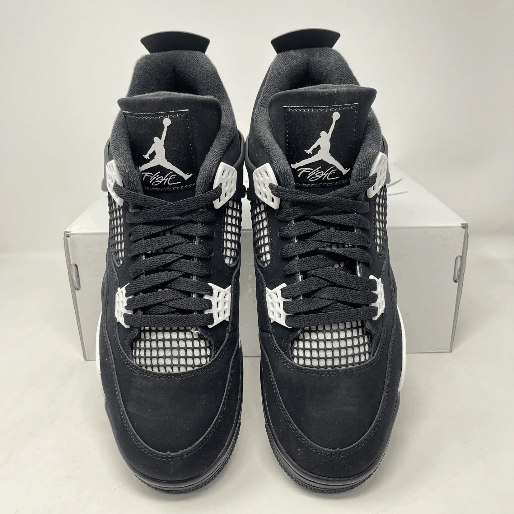 Jordan 4 Retro White Thunder sneakers, brand new with accessories included.