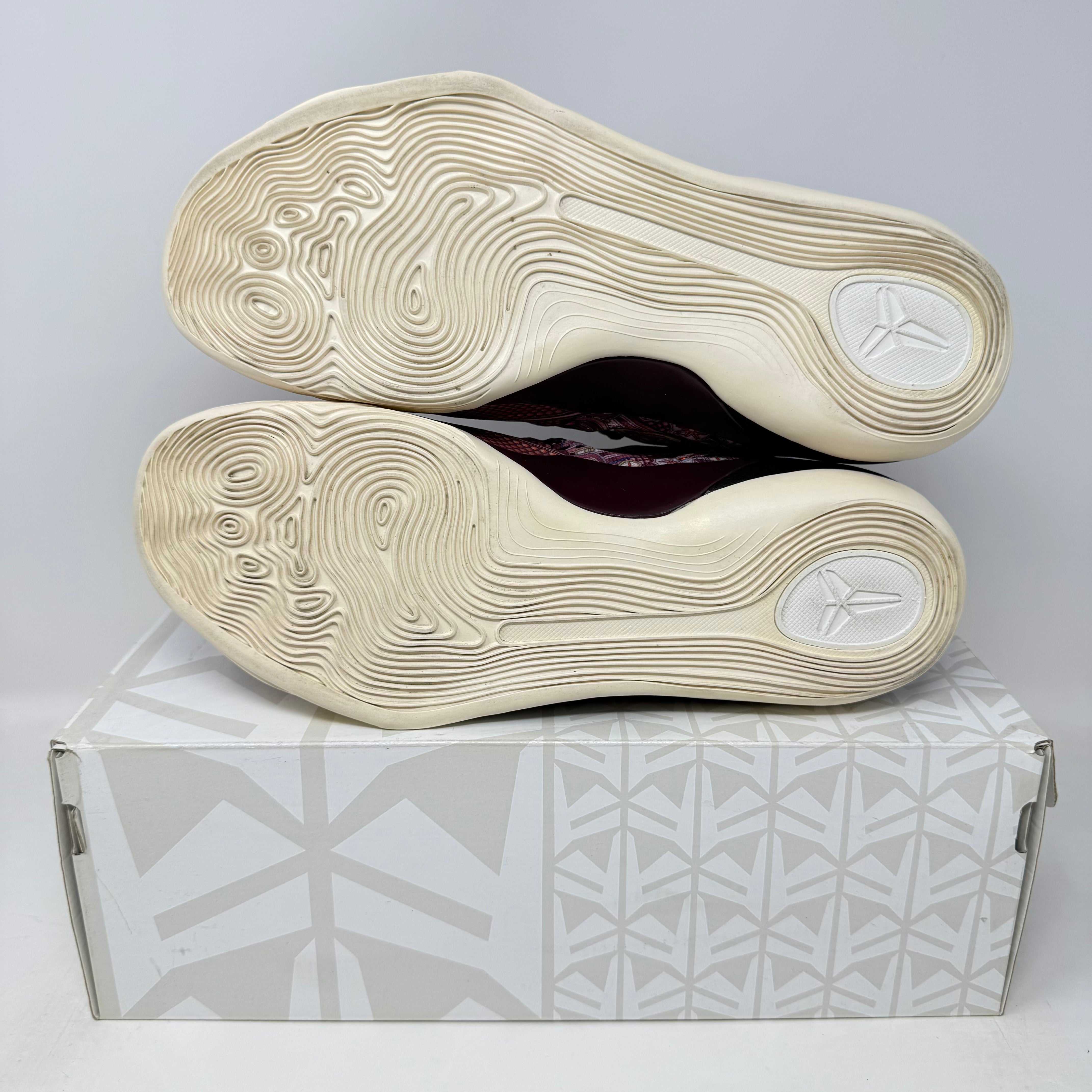 Nike Kobe 9 EM Low Silk sneakers, pre-owned, with original box and accessories included.