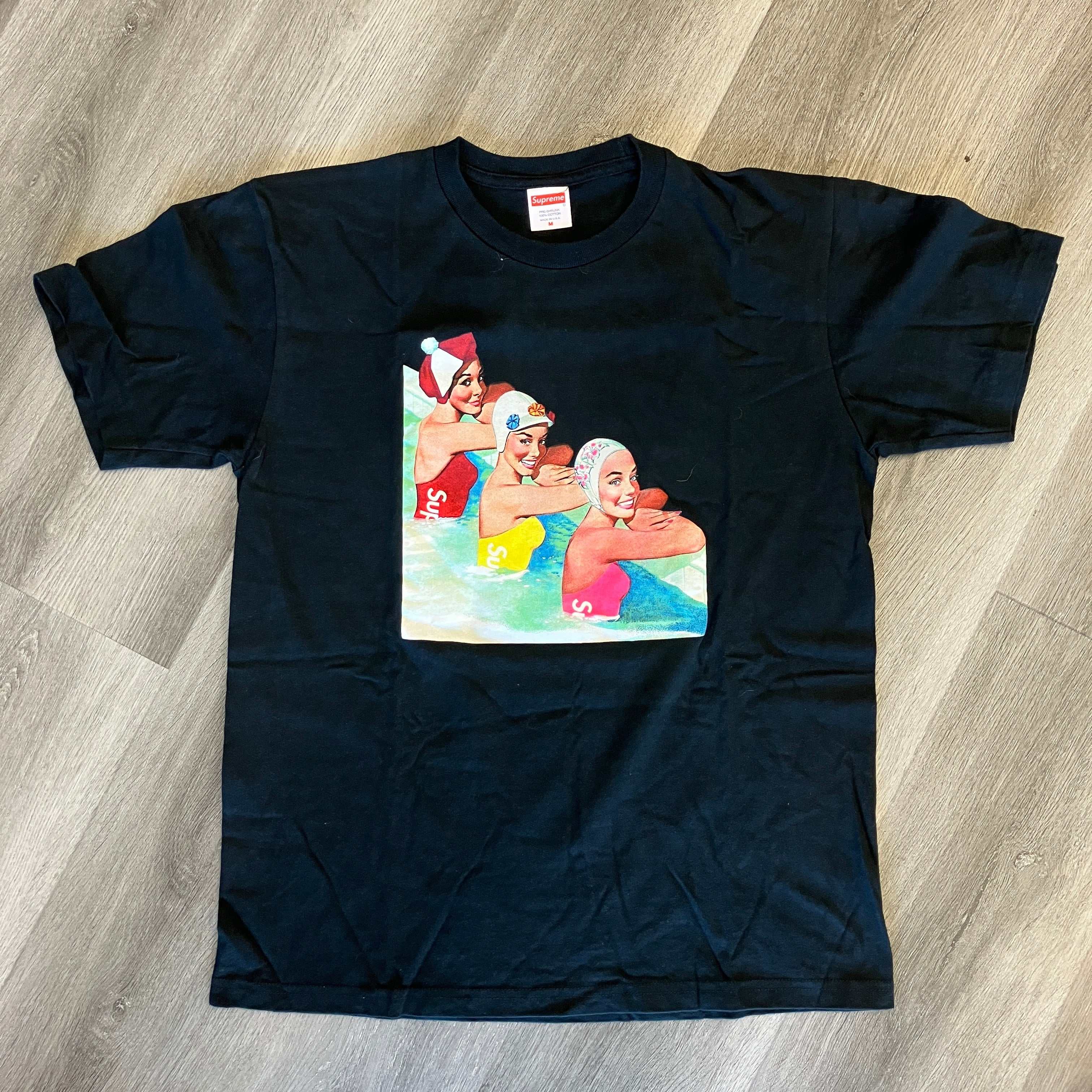 Black Supreme Swimmers Tee featuring colorful swimmer graphic, brand new, 21" pit to pit, 30" length