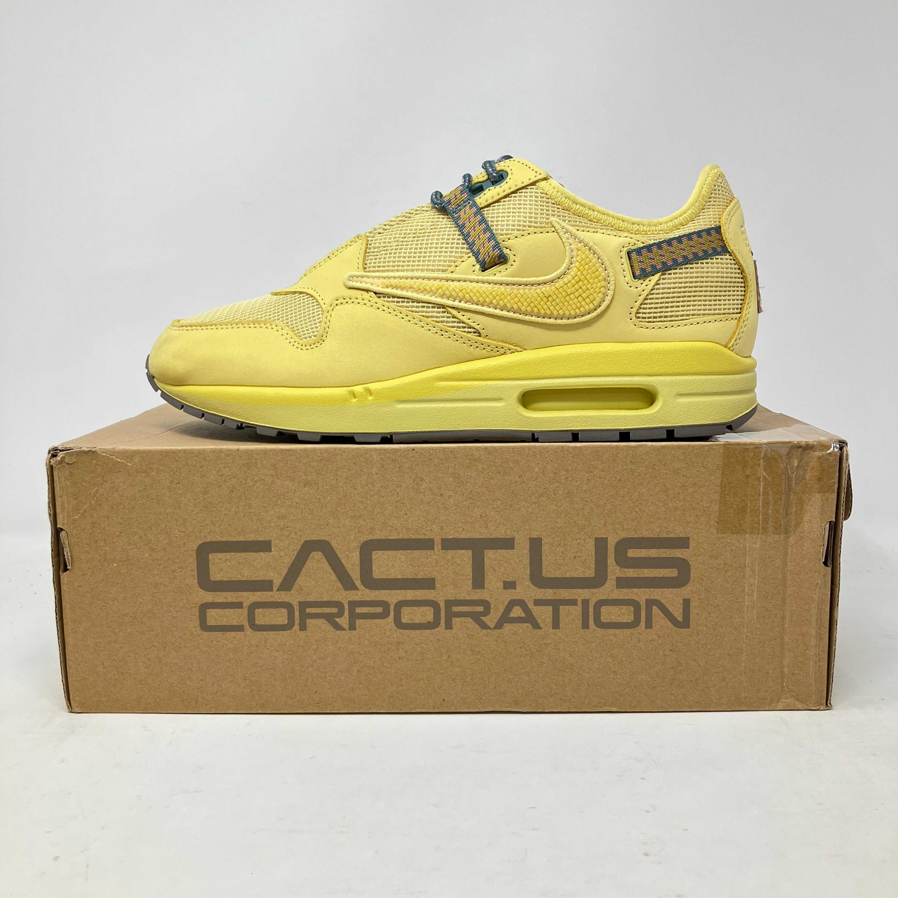 Nike Air Max 1 Travis Scott Cactus Jack Saturn Gold sneaker on box.