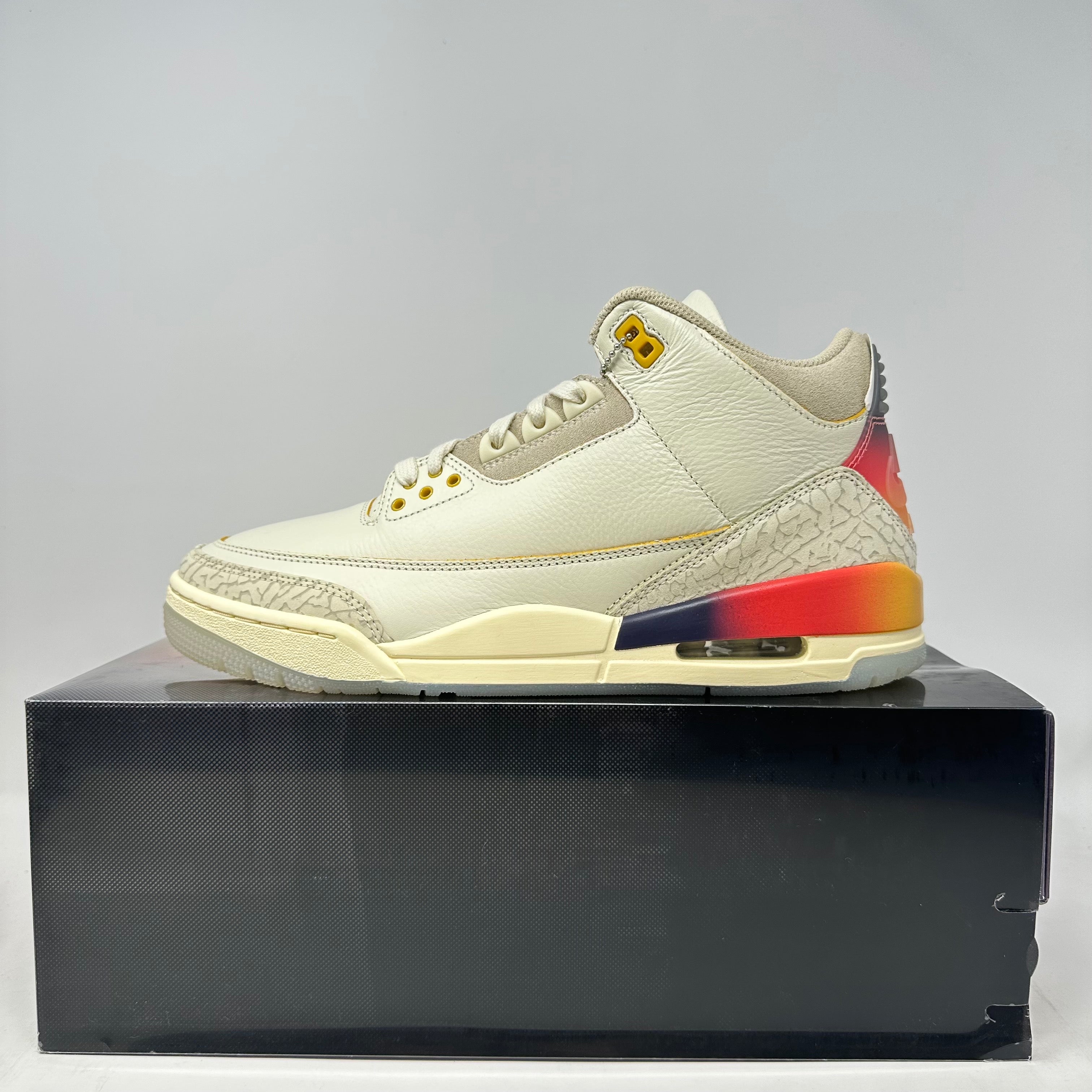 Jordan 3 Retro SP J Balvin Medellín Sunset sneaker in cream with sunset gradient heel on black box