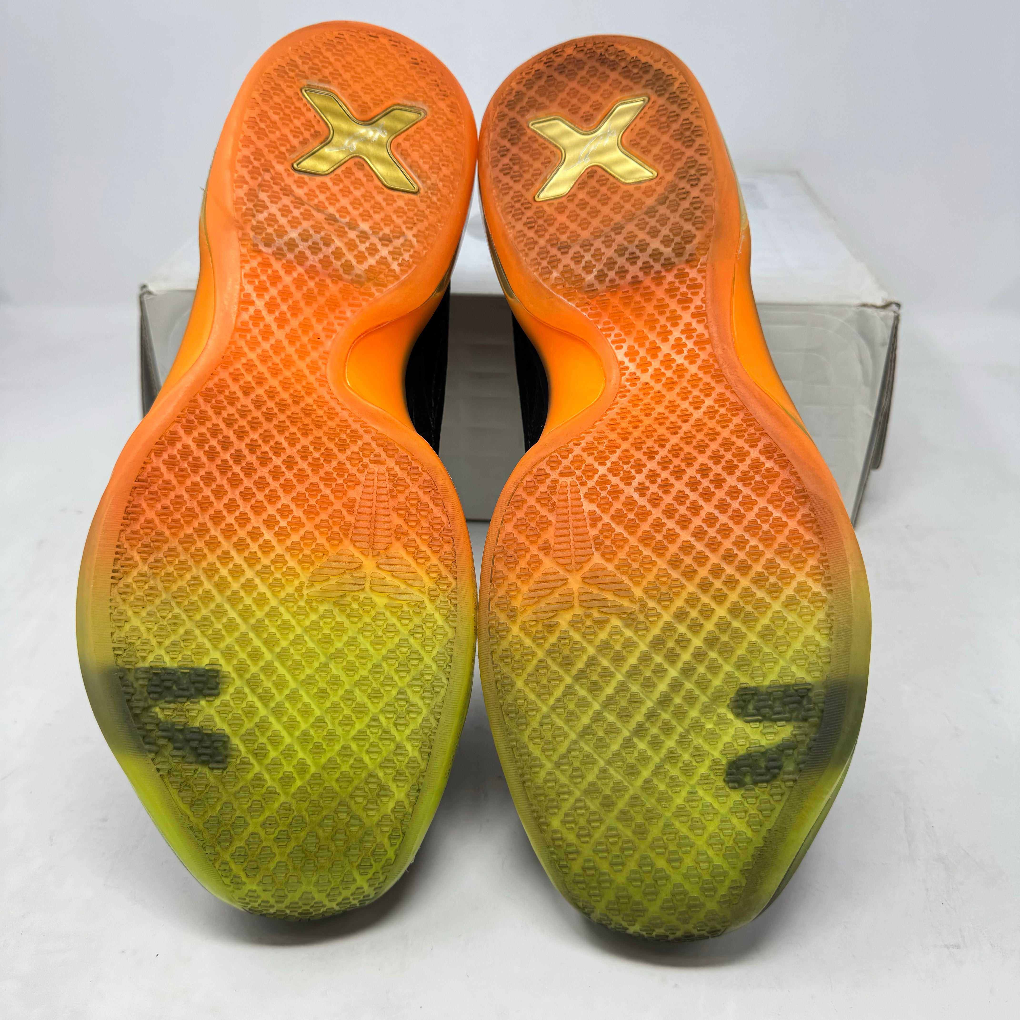 Nike Kobe 10 All-Star shoes, pre-owned, vibrant orange and yellow soles, accessories included.