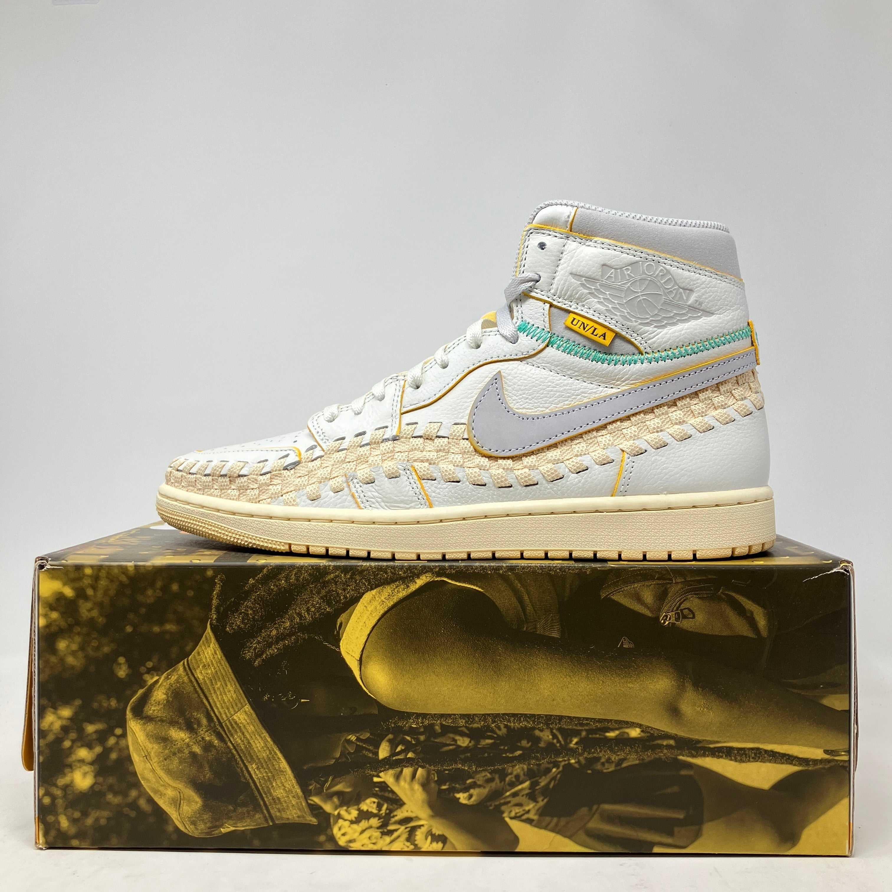 Jordan 1 Retro High OG SP Union LA Bephies Beauty Supply Summer of ‘96 sneaker side view on branded box