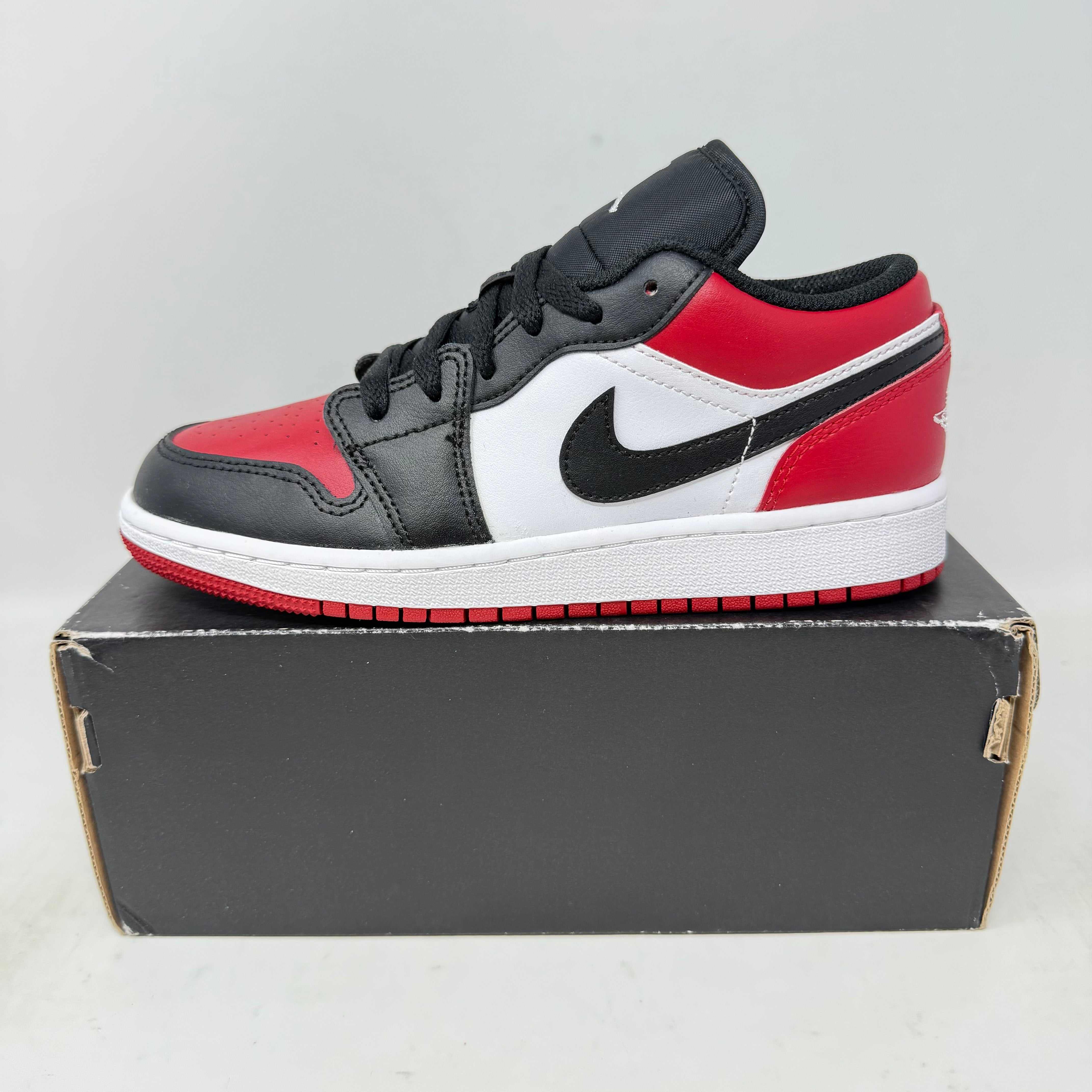 Jordan 1 Low Bred Toe sneakers in brand new condition on box.