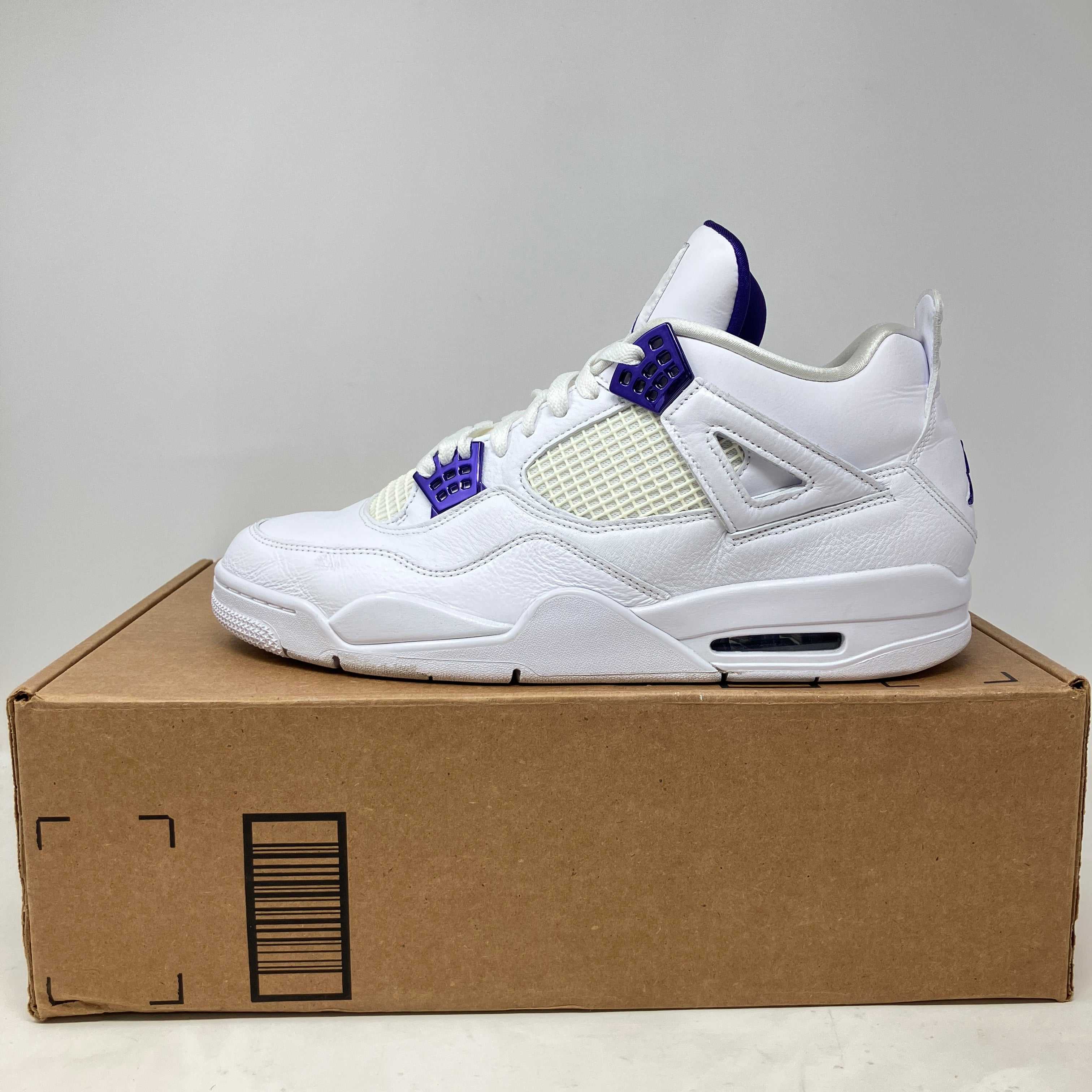 Pre owned Jordan 4 Retro Metallic Purple sneaker on replacement box