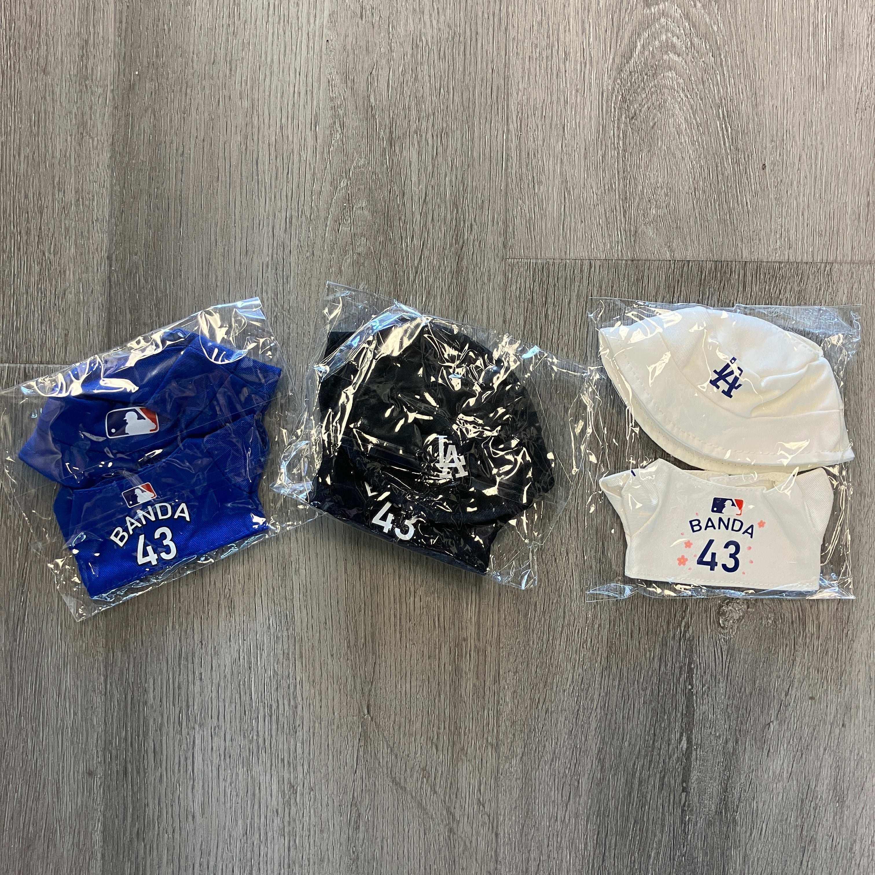 Anthony Banda Dodgers jersey and cap sets in blue, black, and white packaging