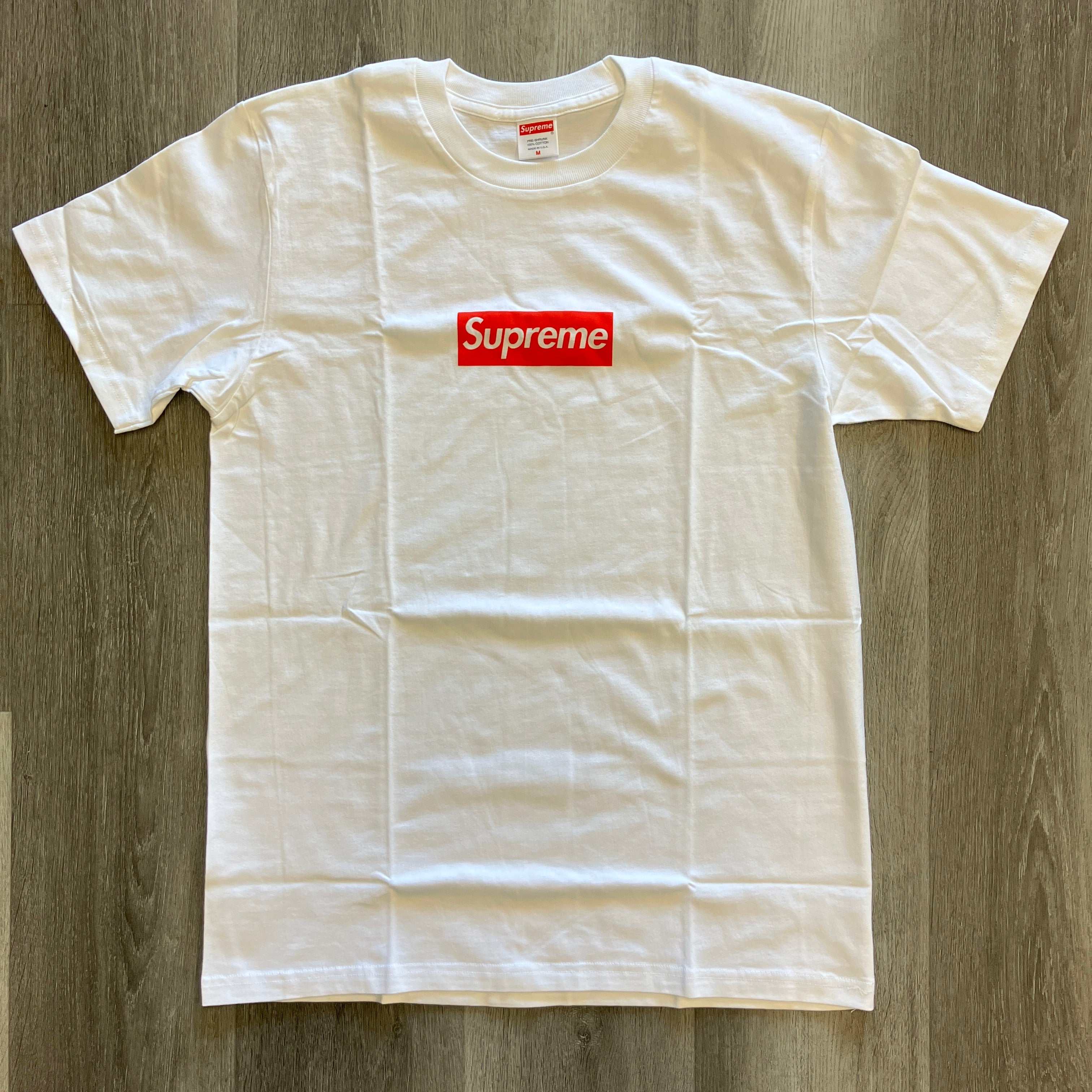 White Supreme West Hollywood box logo t-shirt in brand new condition on wooden background