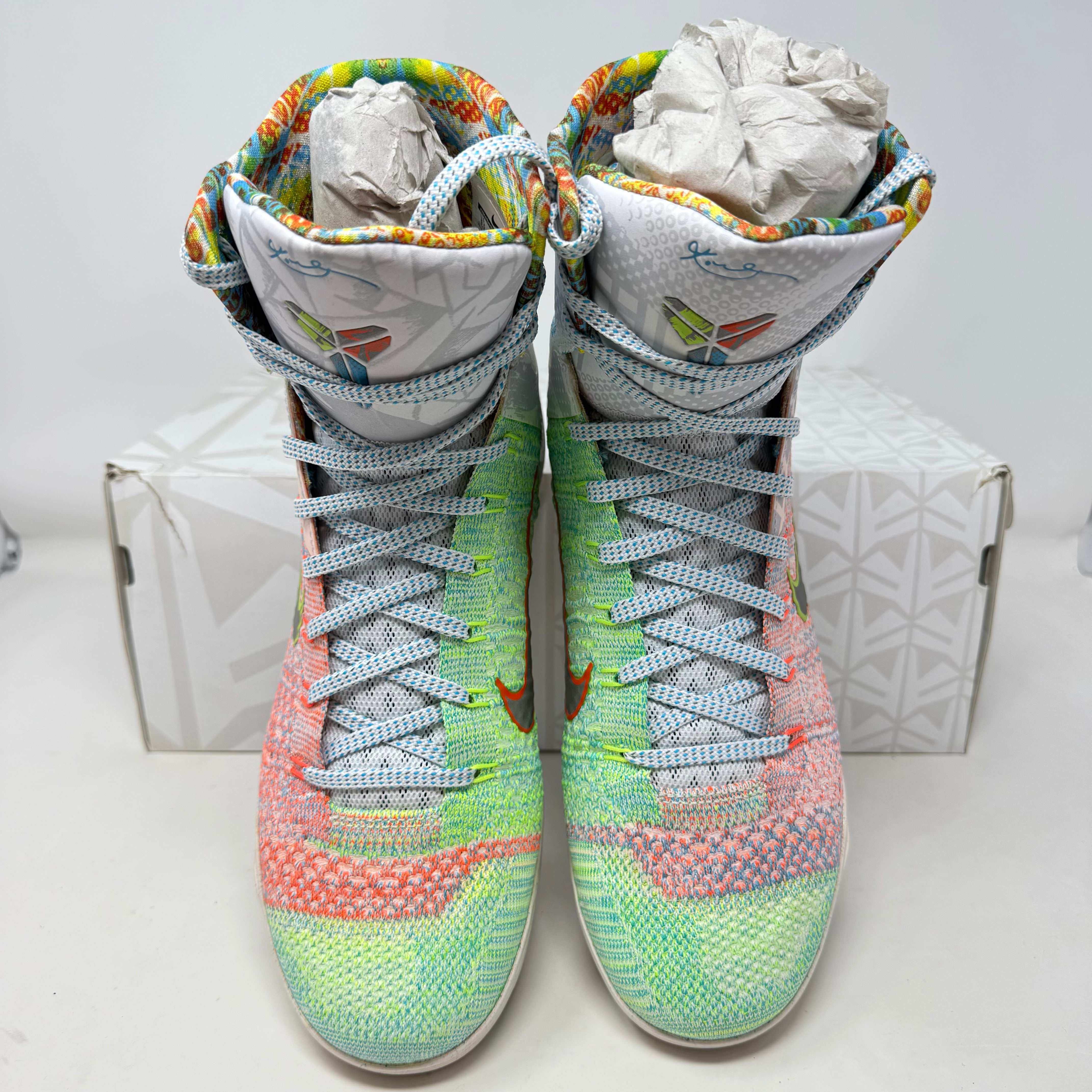 Nike Kobe 9 Elite What the Kobe pre-owned shoes with colorful design and included accessories.