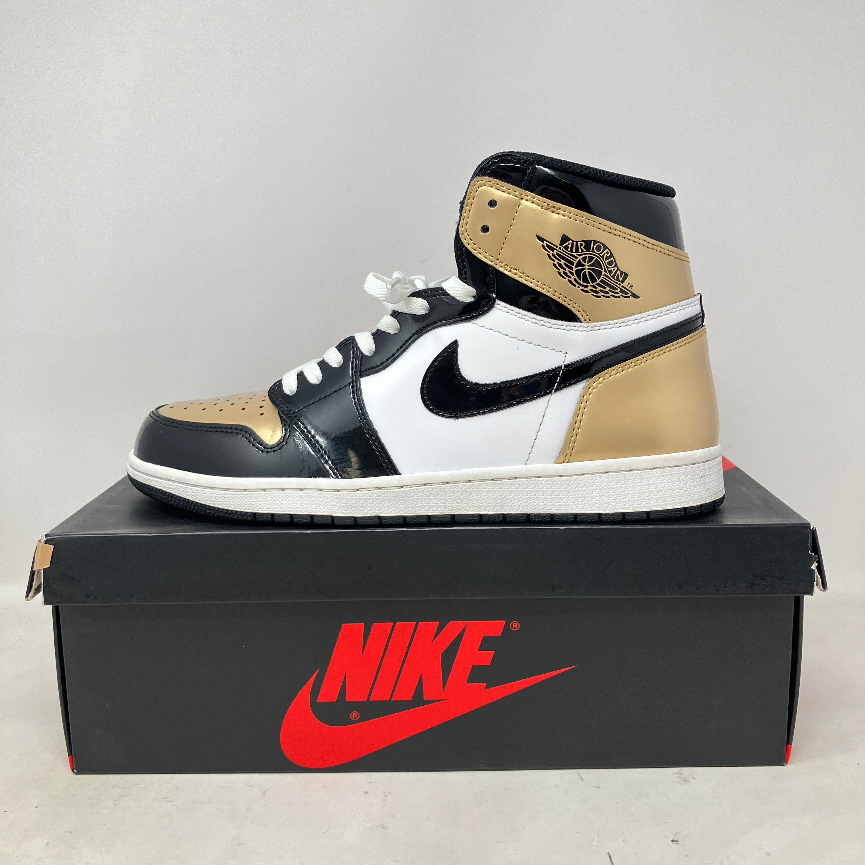 Jordan 1 Retro High NRG Patent Gold Toe