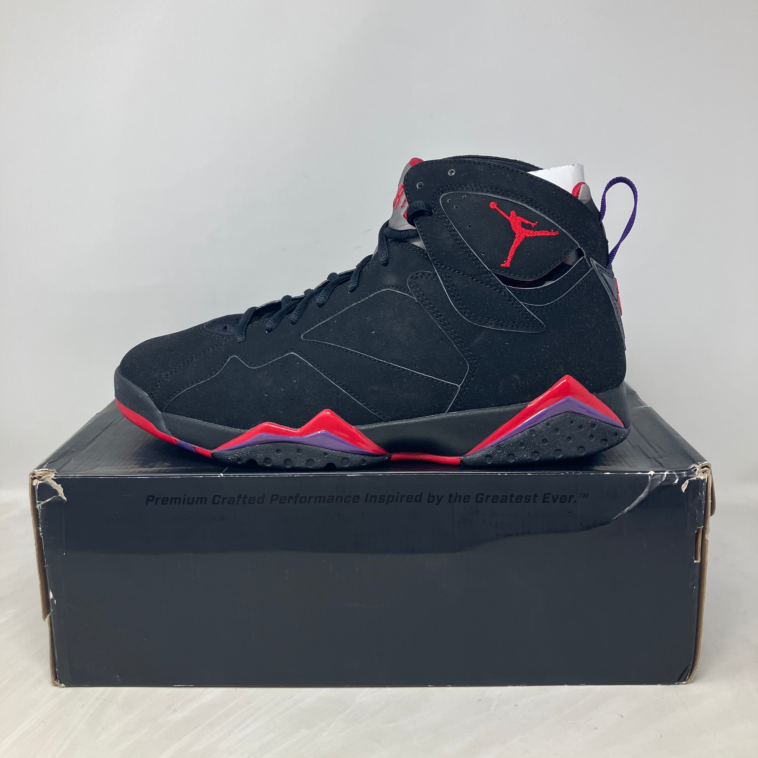 Jordan 7 Retro Raptors 2012 sneakers brand new on black box with red and purple accents