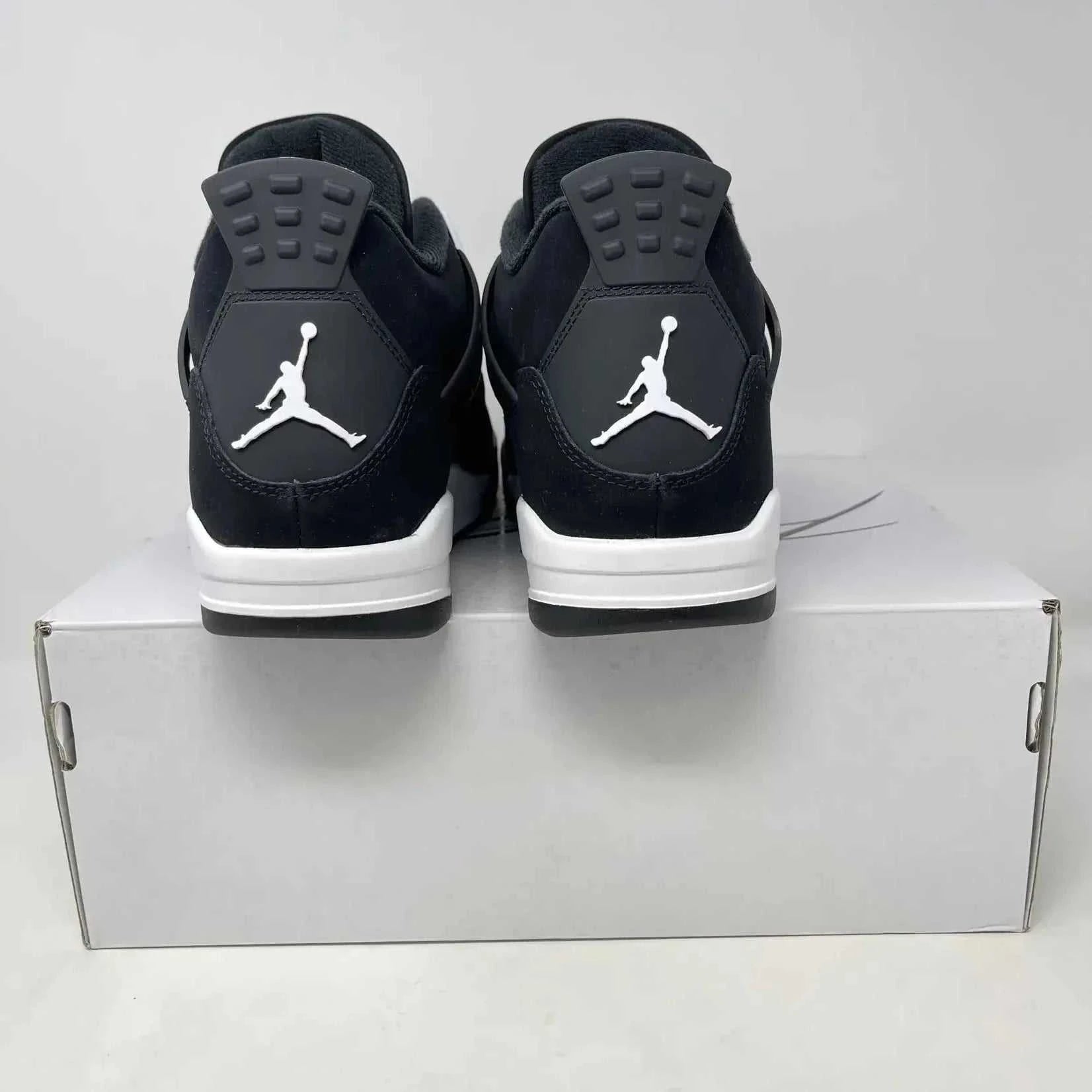 Jordan 4 Retro White Thunder sneakers, brand new condition, complete with accessories.