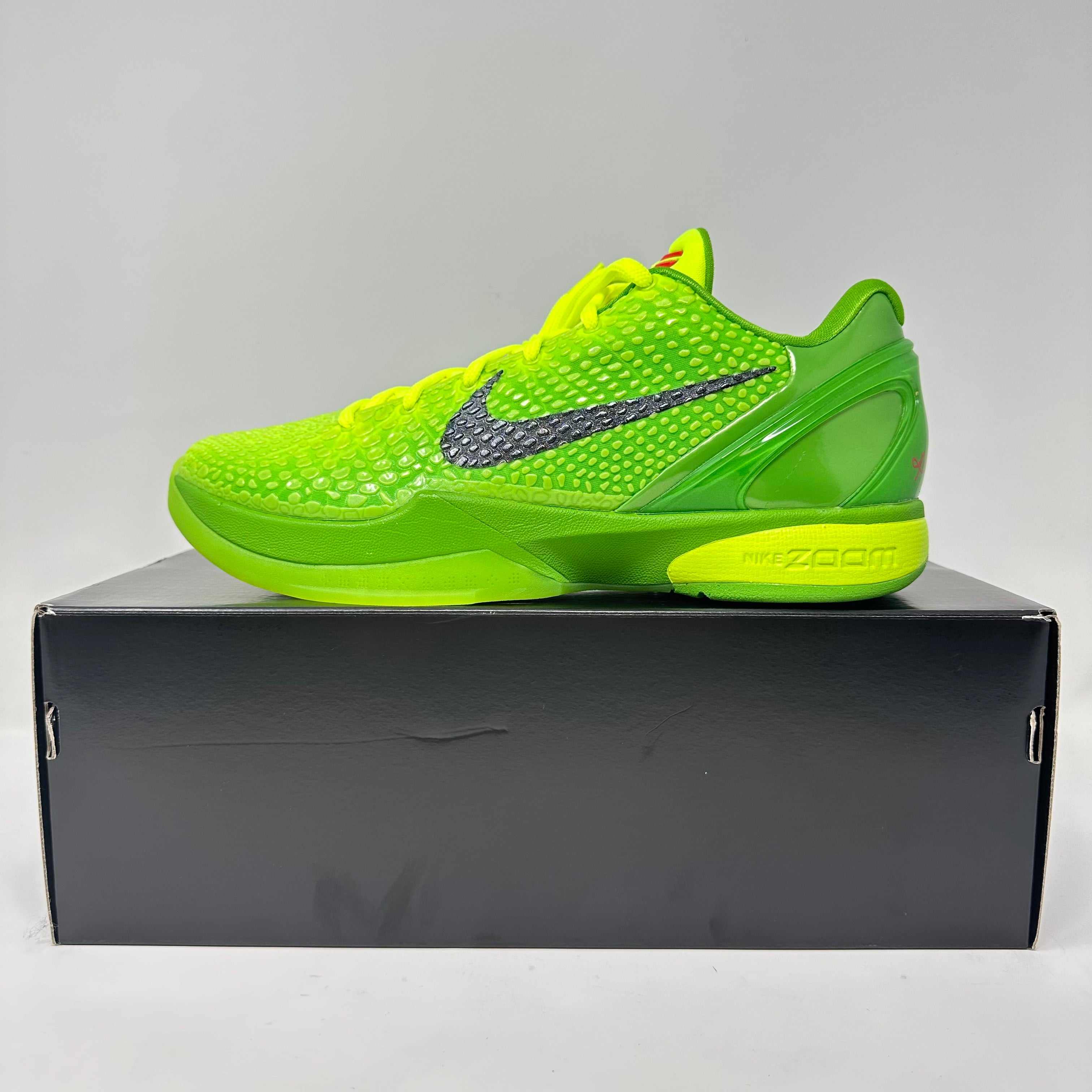 Nike Kobe 6 Protro Grinch basketball shoe in bright green on black box, brand new with accessories included