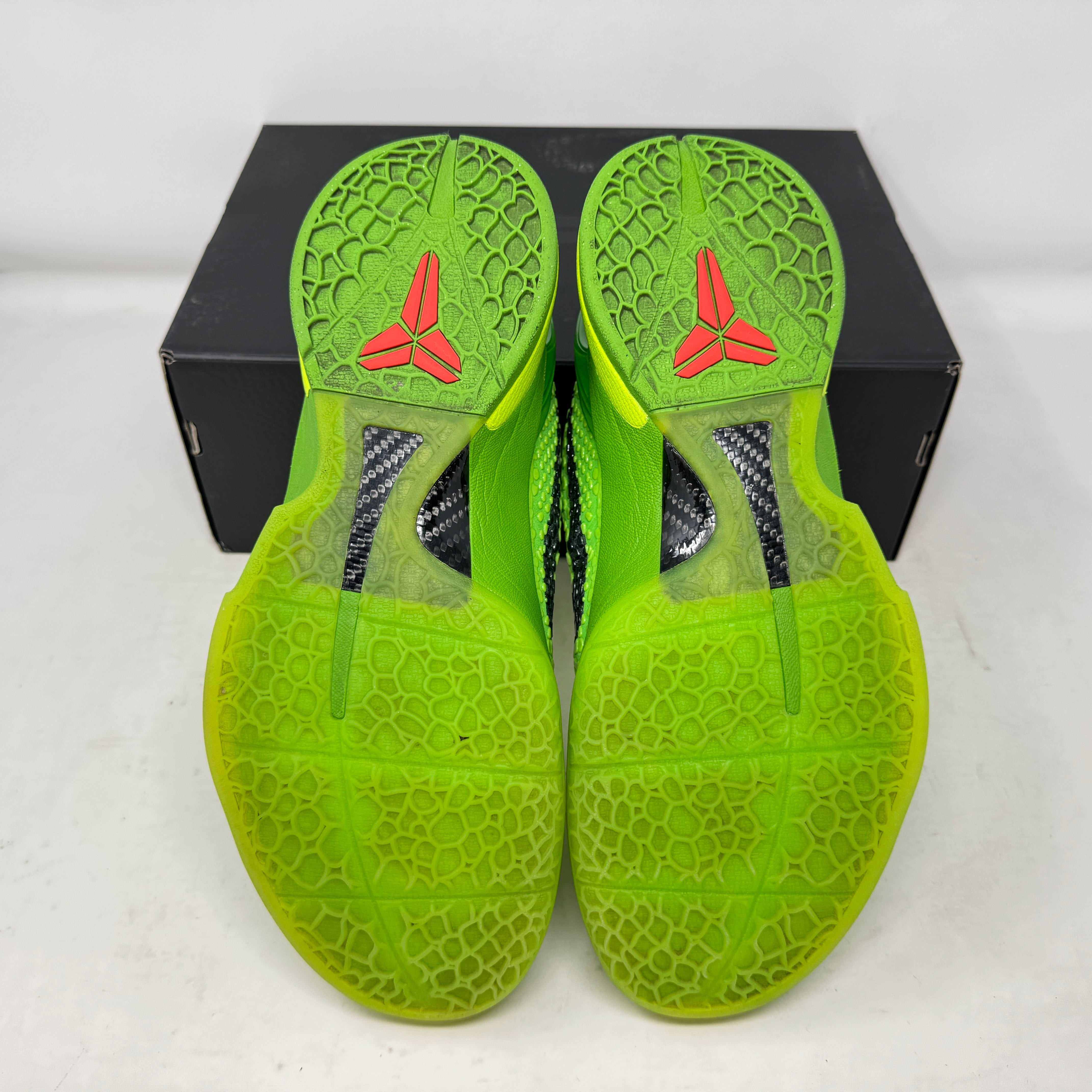 Green Nike Kobe 6 Protro Grinch sneakers with a textured sole, pre-owned condition, rep box included.