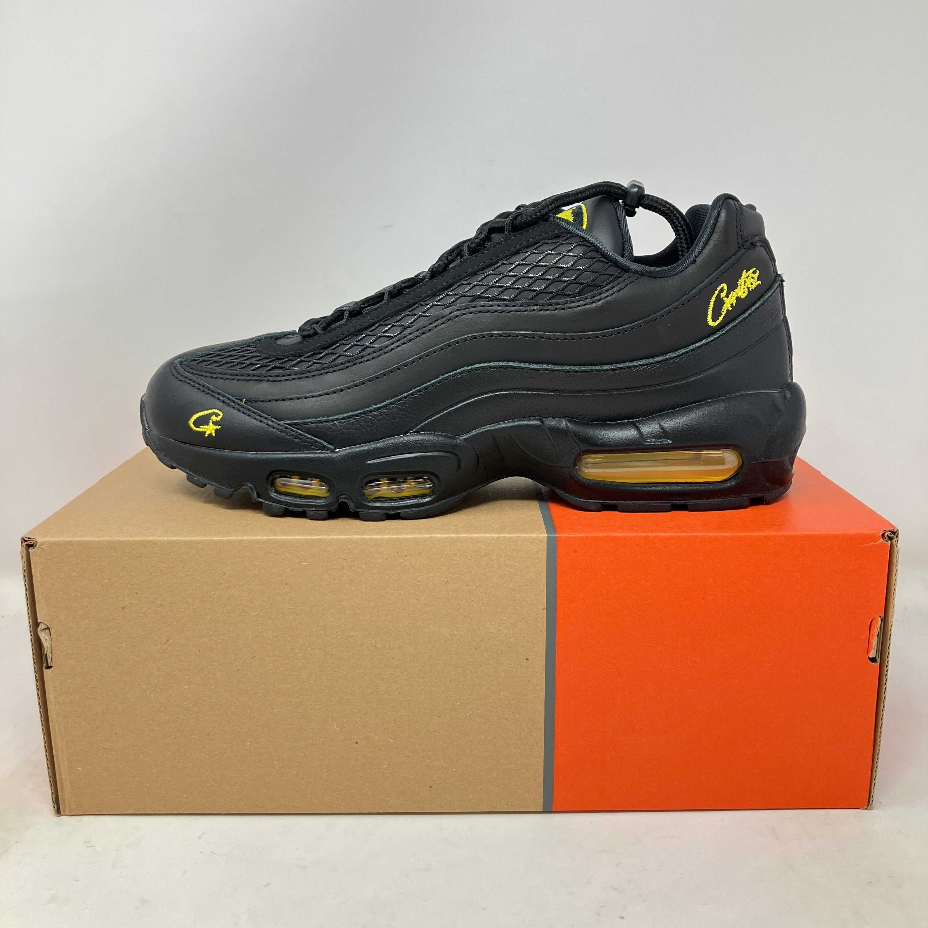 Nike Air Max 95 Corteiz Honey Black sneakers on box, brand new with accessories.