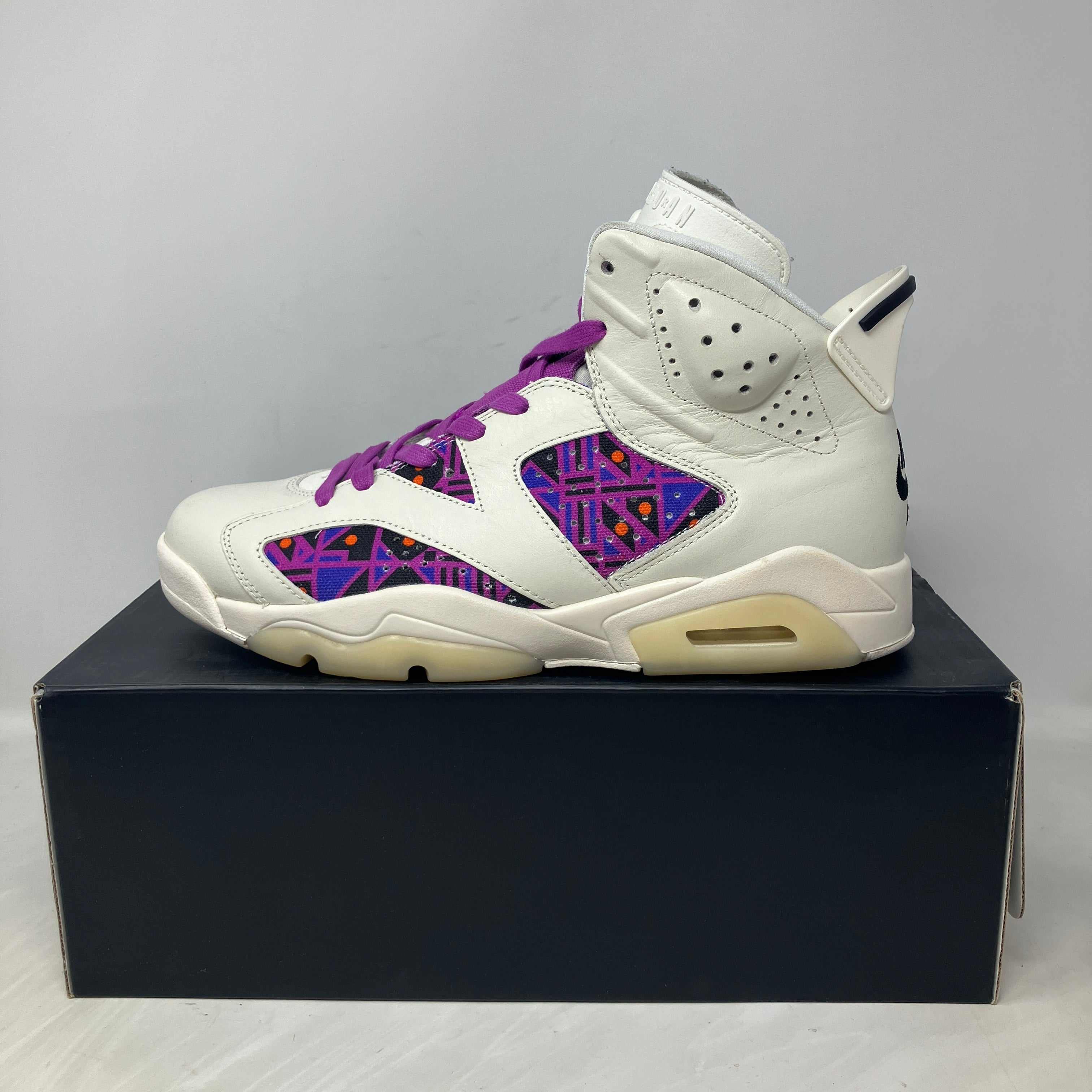 Pre-owned Jordan 6 Retro Quai 54 sneaker with white leather and purple accents on black box