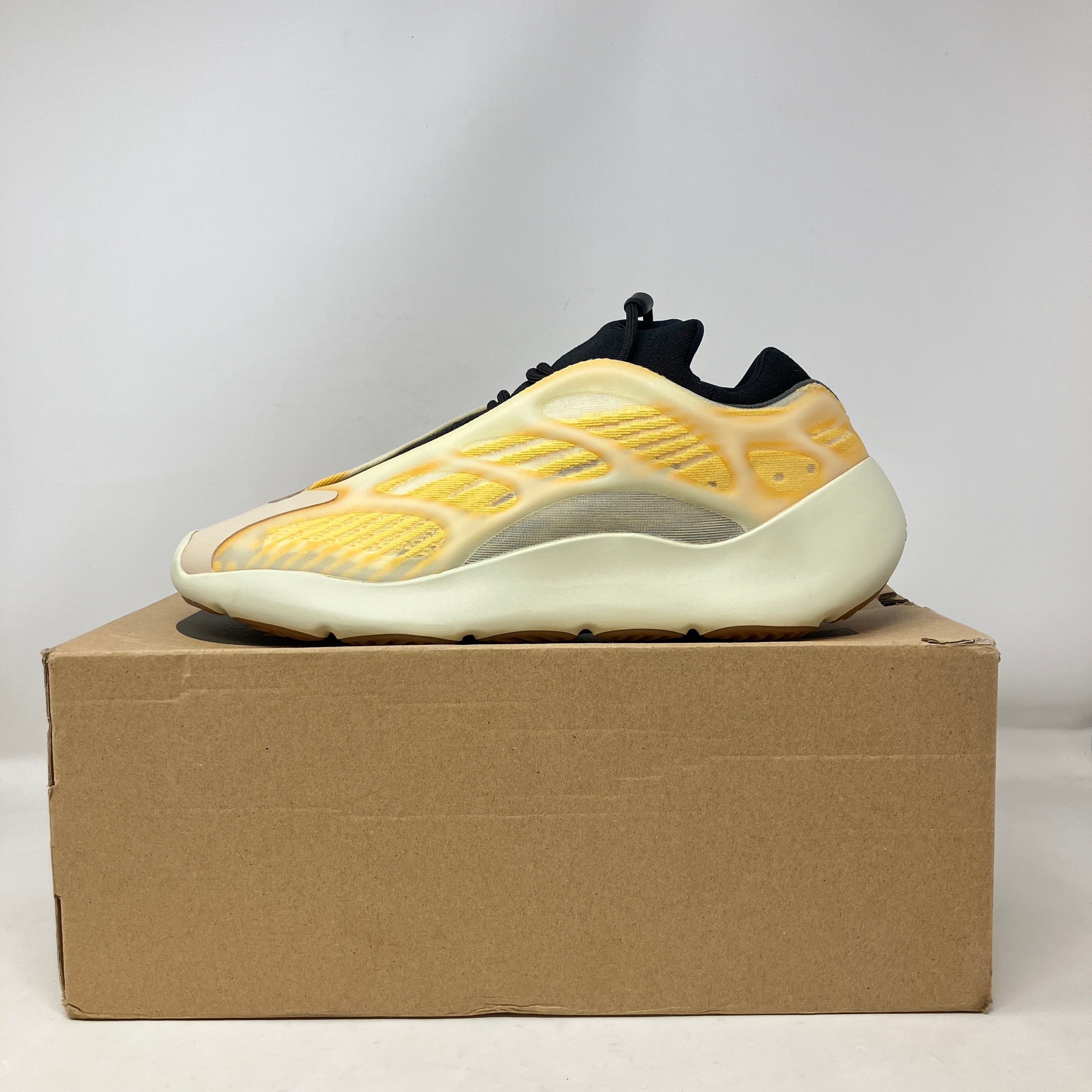 adidas Yeezy 700 V3 Mono Safflower sneaker in yellow and cream on cardboard box, brand new with all accessories included