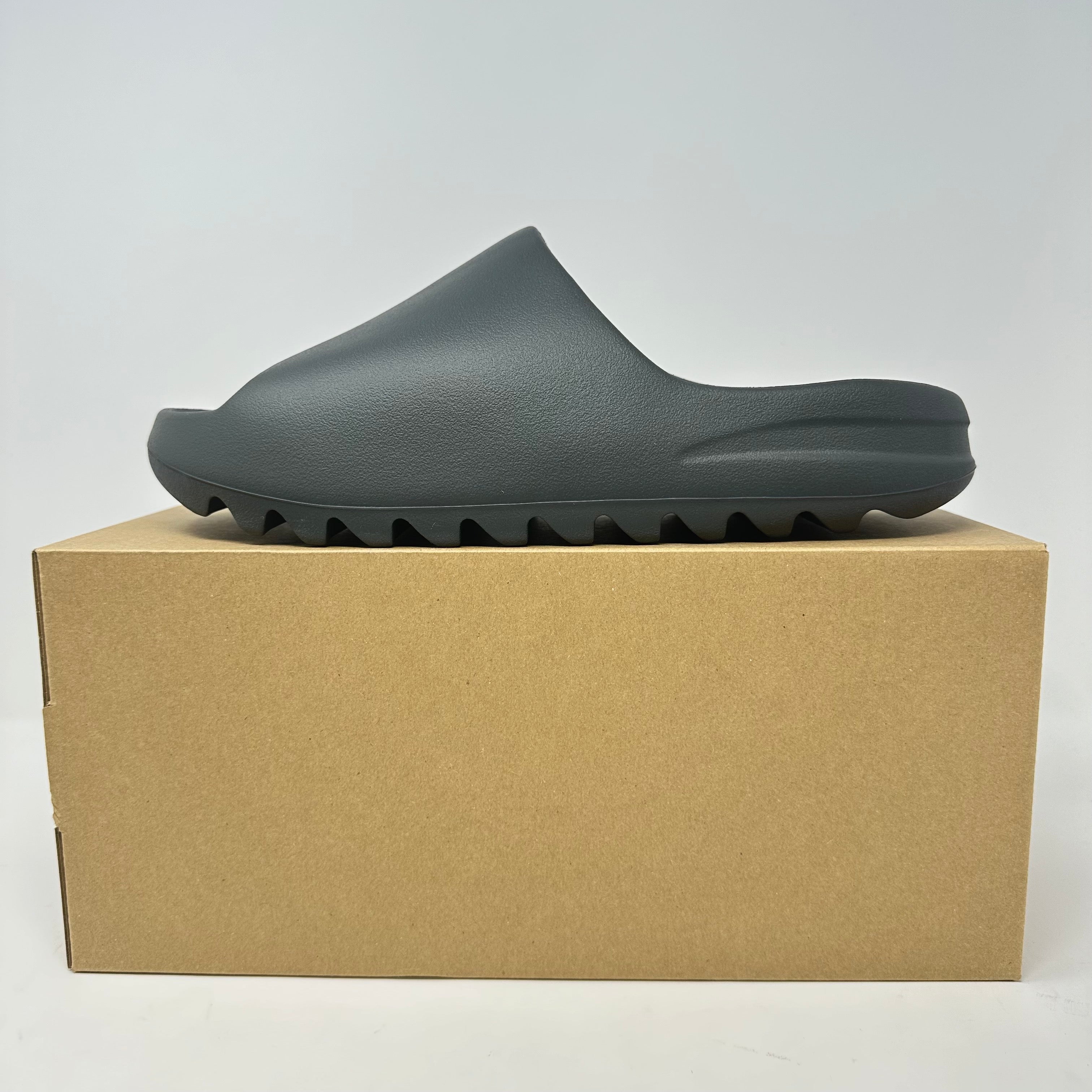 adidas Yeezy Slide Dark Onyx on box, brand new with accessories included
