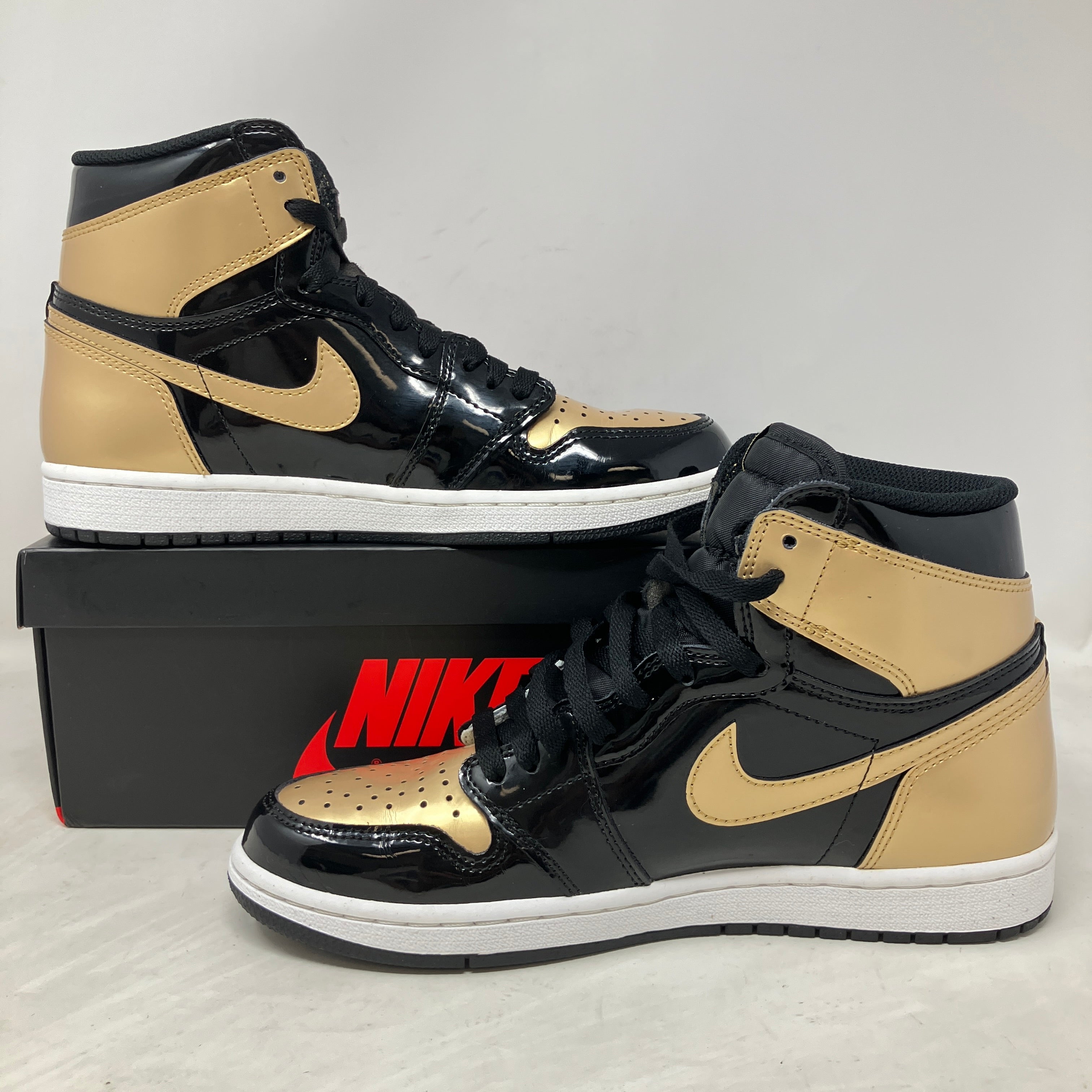 Jordan 1 Retro High NRG Patent Gold Toe