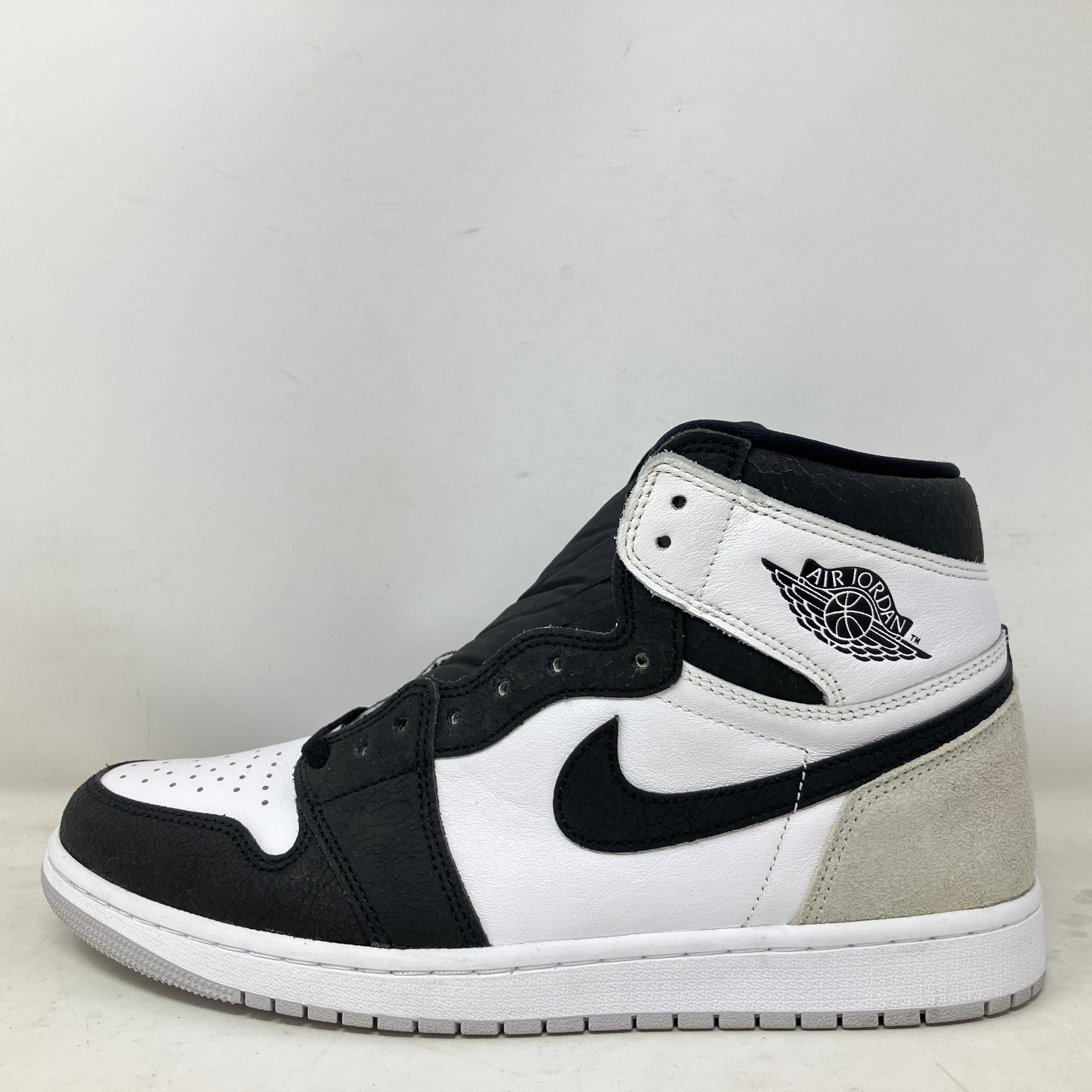Jordan 1 Retro High OG sneaker in black, white, and gray, brand new with all accessories included
