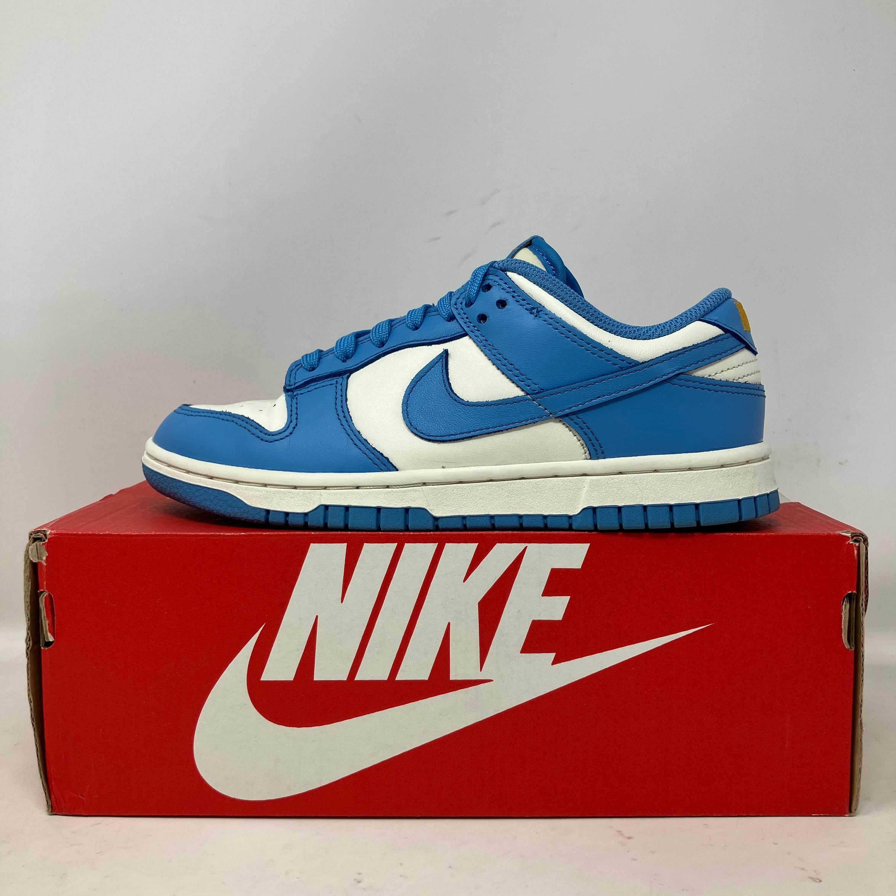 Nike Dunk Low Coast women's sneaker in blue and white on red Nike box