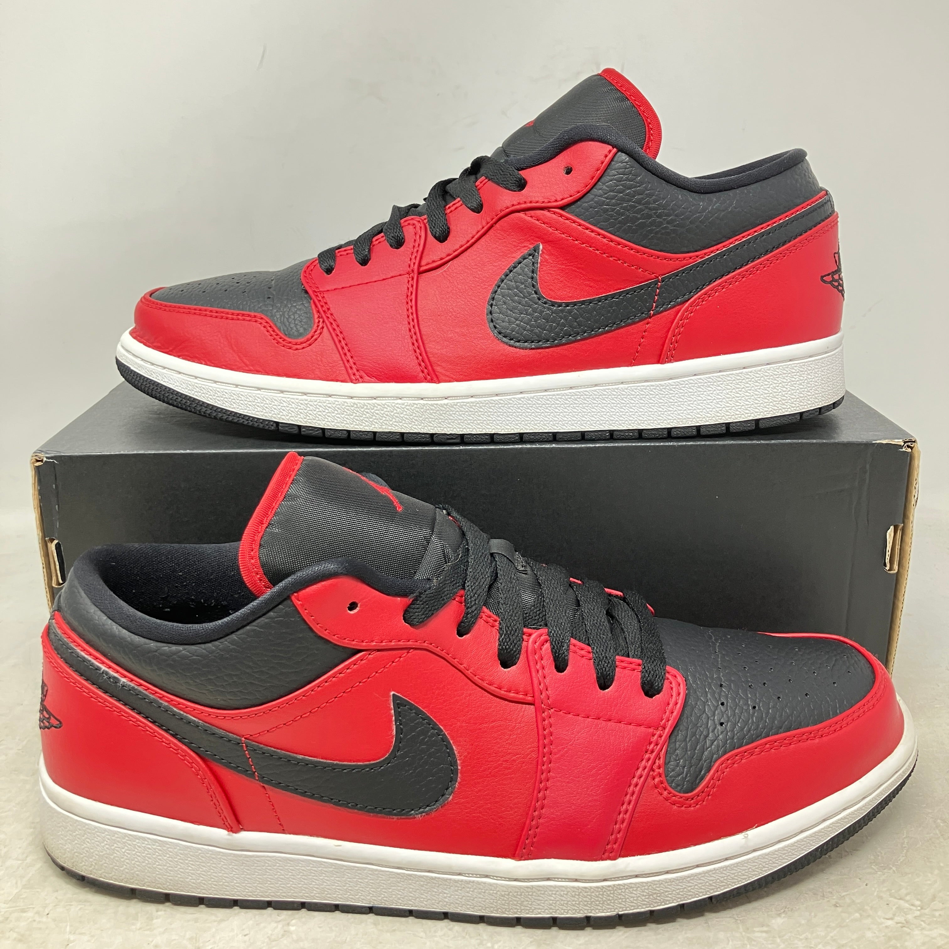 Jordan 1 Low Reverse Bred Pebbled Swoosh