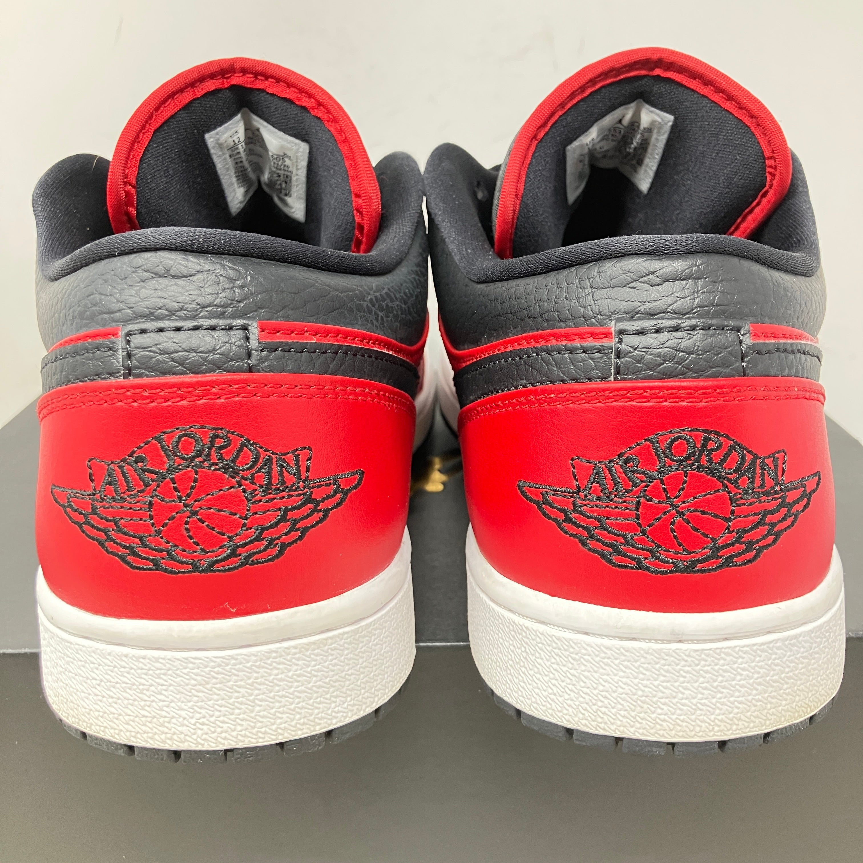 Jordan 1 Low Reverse Bred Pebbled Swoosh