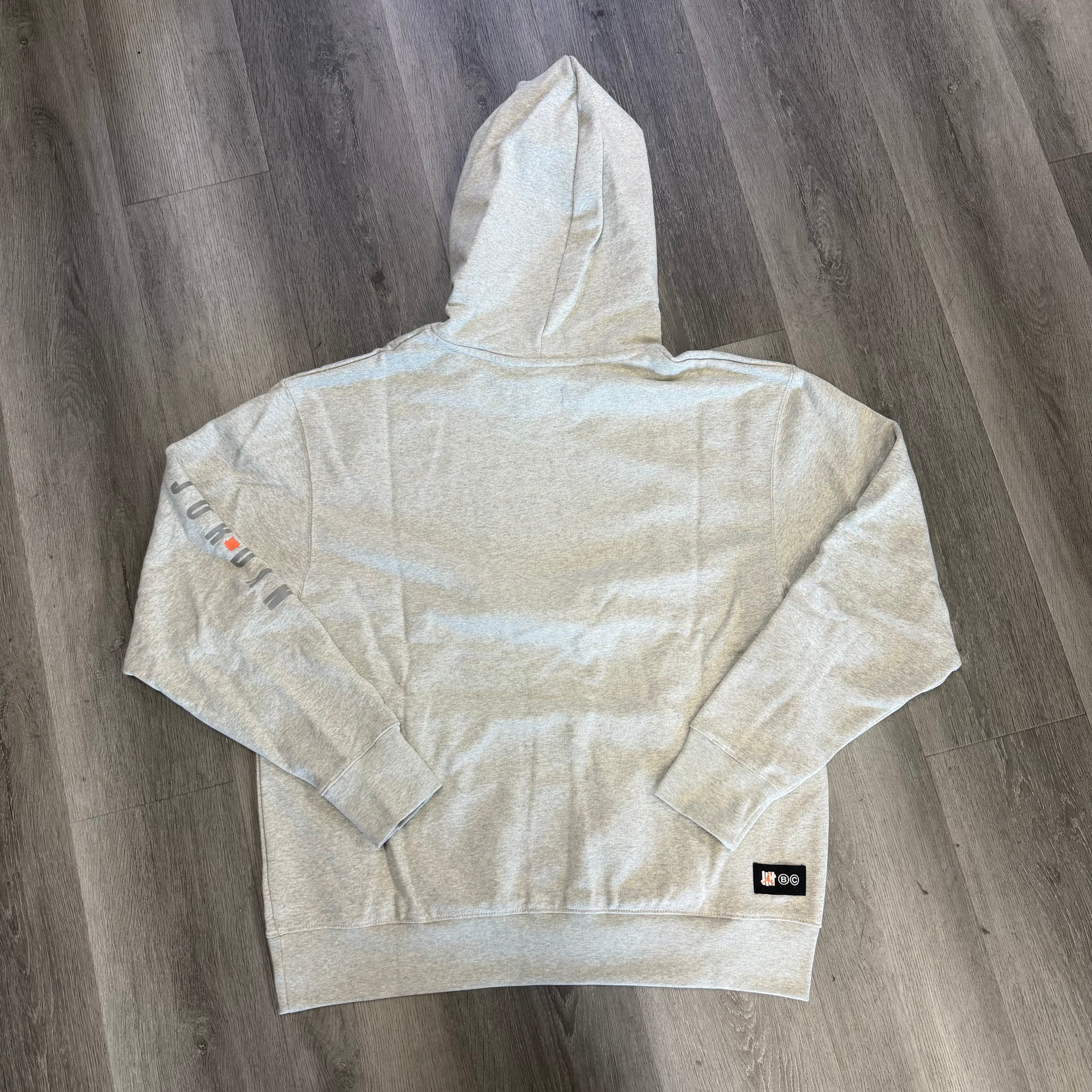 Jordan x Undefeated Weights Hoodie Heather Grey