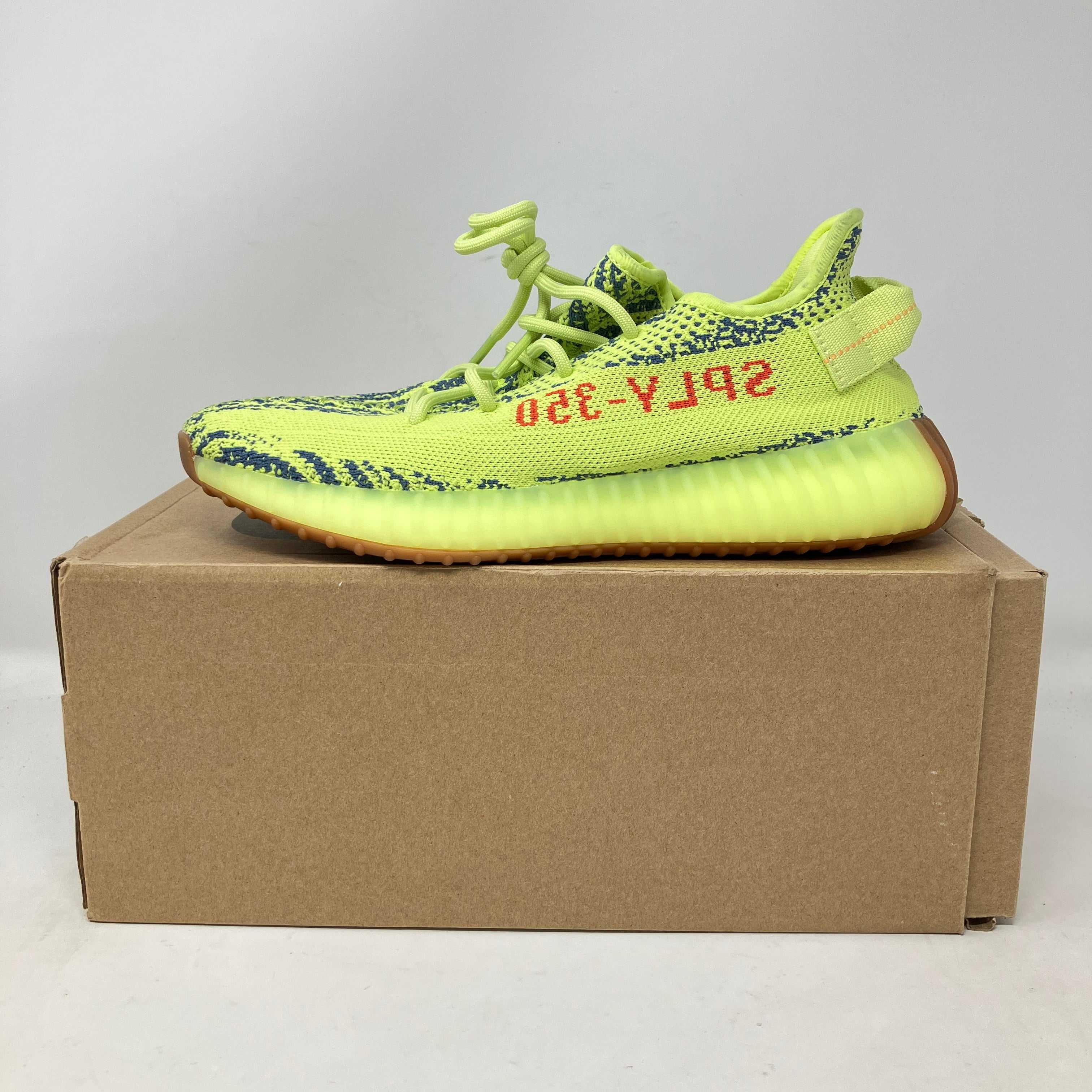 adidas Yeezy Boost 350 V2 Semi Frozen Yellow pre-owned sneakers with box and accessories included.