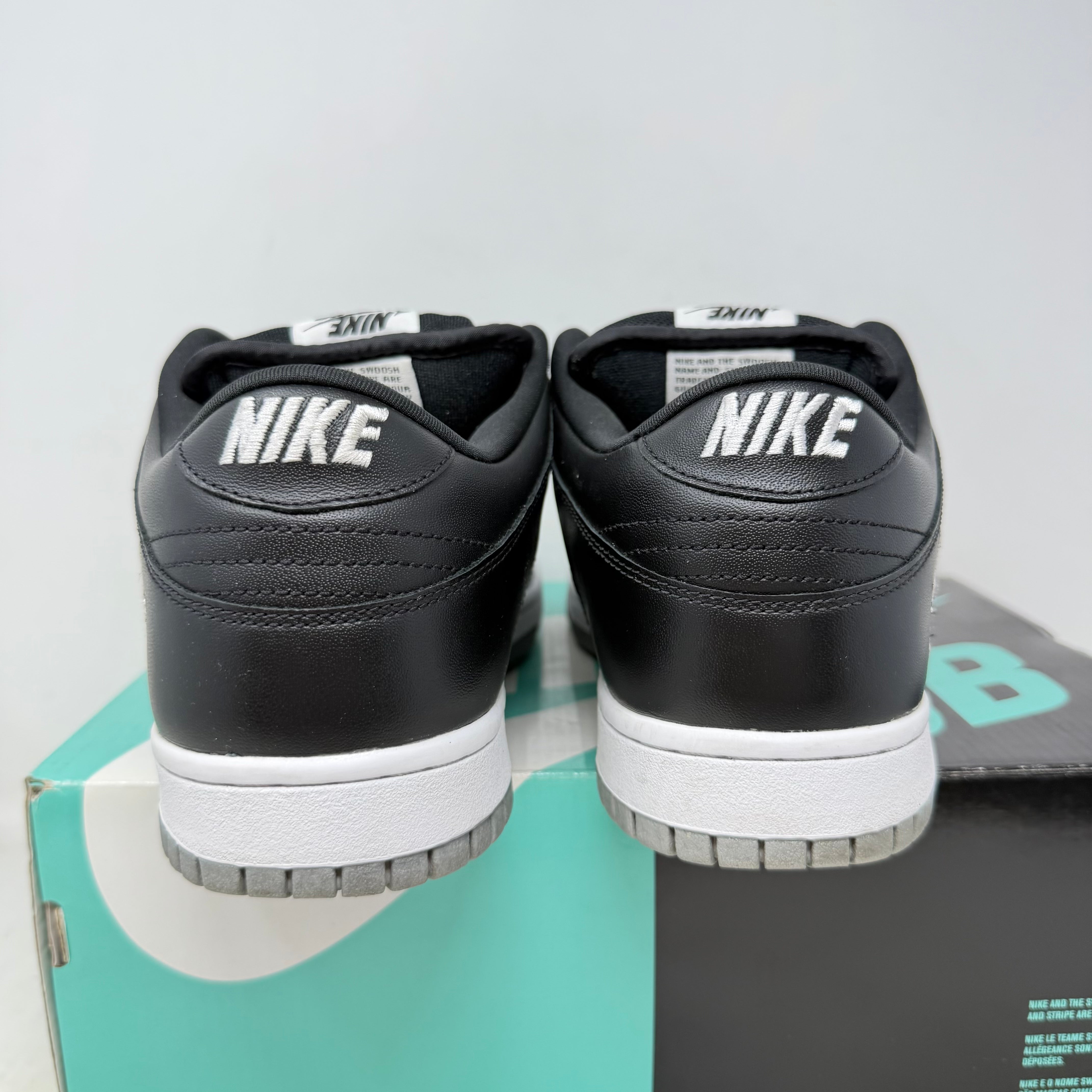 Nike SB Dunk Low Supreme Jewel Swoosh Silver