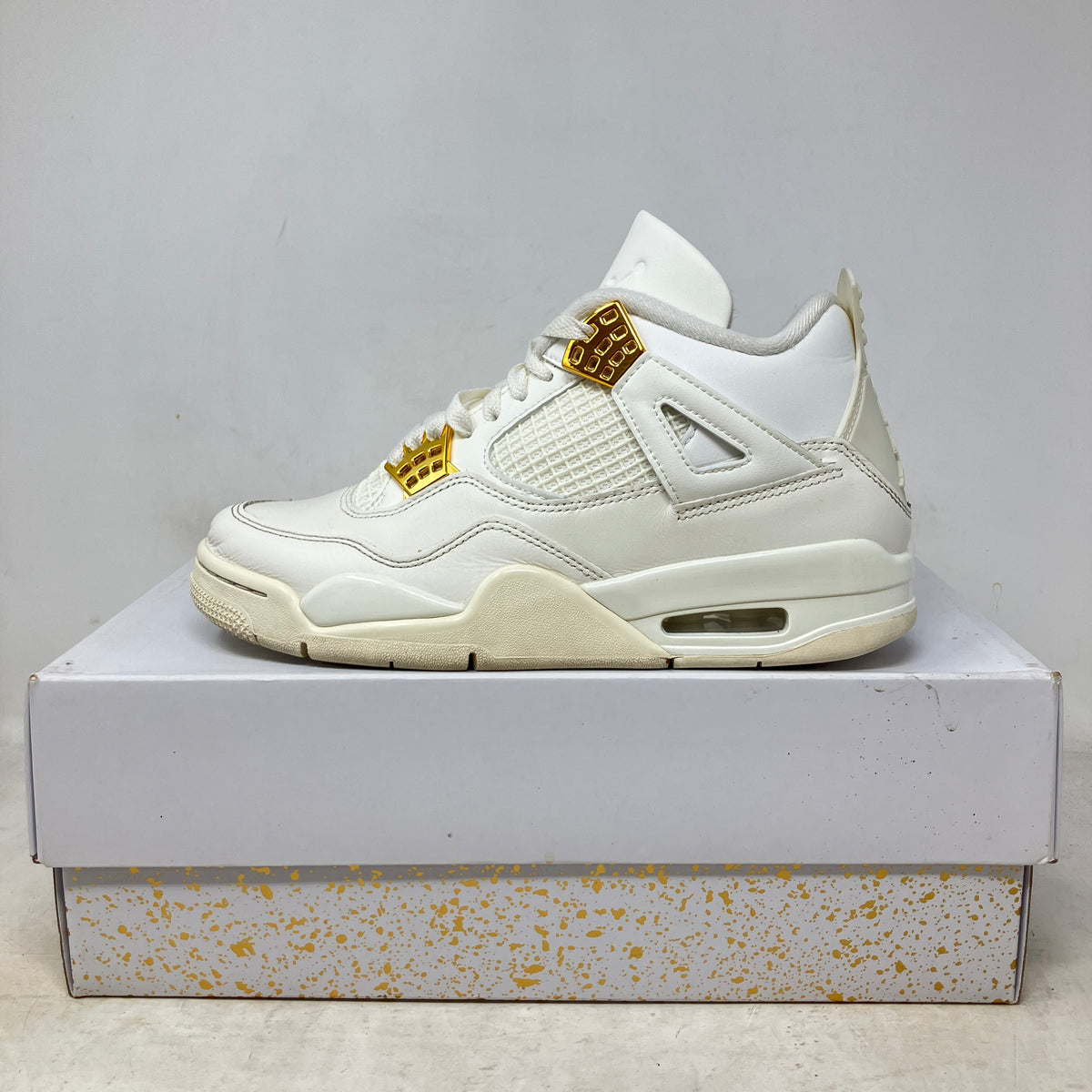 Jordan 4 Retro Metallic Gold (Women's)