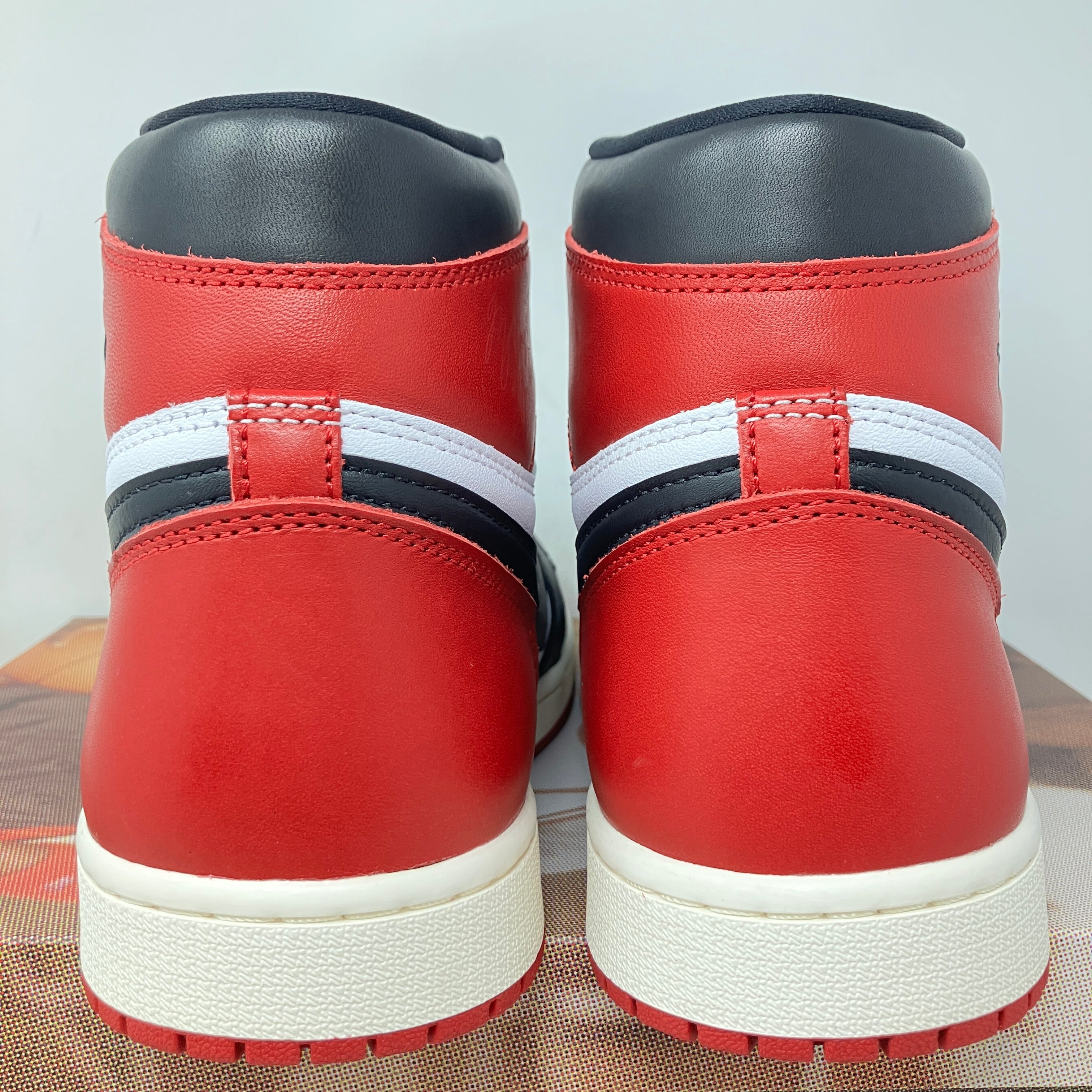 Jordan 1 Retro High OG Black Toe Reimagined