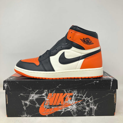 Jordan 1 Retro High OG Shattered Backboard 2025 sneaker in orange, black, and white on original Nike box