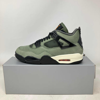 Jordan 4 Retro OG SP Undefeated sneaker in green and black, brand new with all accessories on gray box