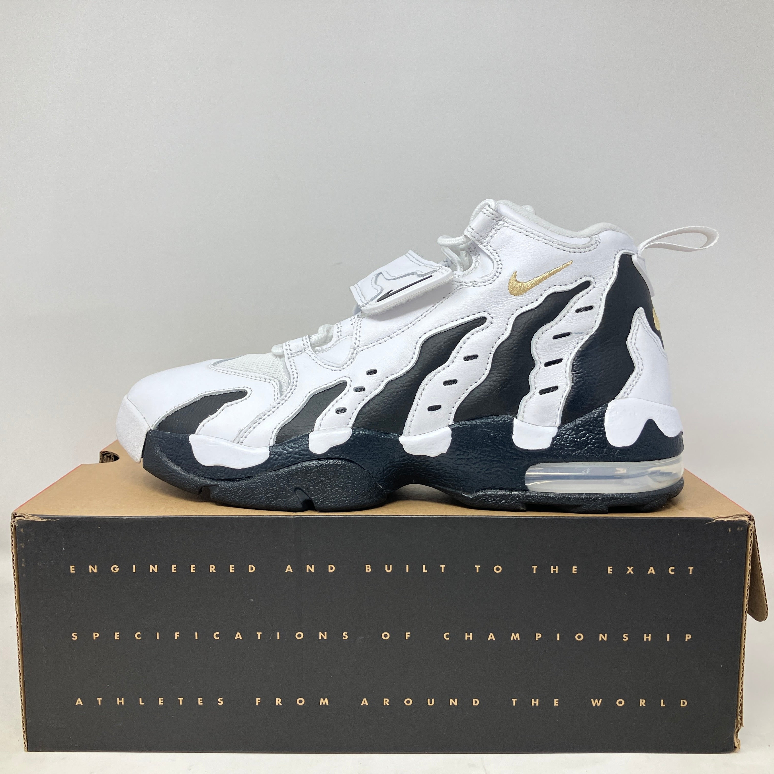 White and black Nike Air DT Max '96 Colorado Away sneaker displayed on its box, pre-owned condition with all accessories included.