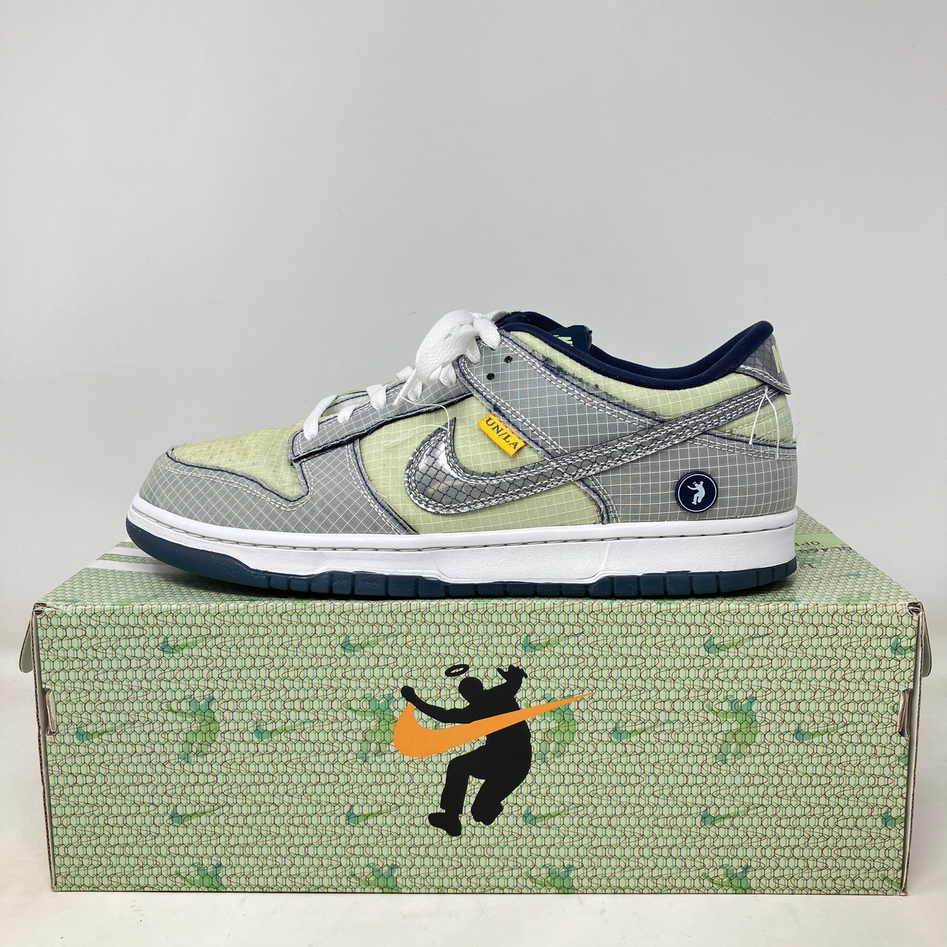 Nike Dunk Low Union Passport Pack Pistachio sneaker on patterned box with pre-owned condition and all accessories included