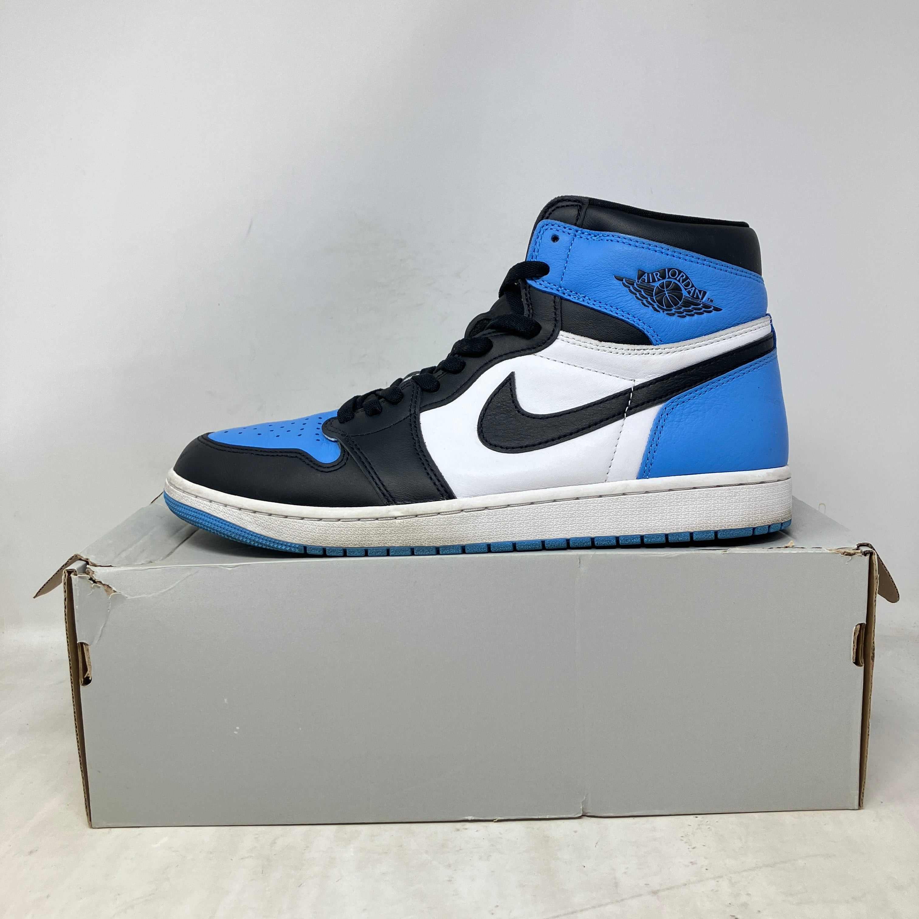 Jordan 1 Retro High OG UNC Toe pre-owned sneaker with replacement box, uncleaned condition